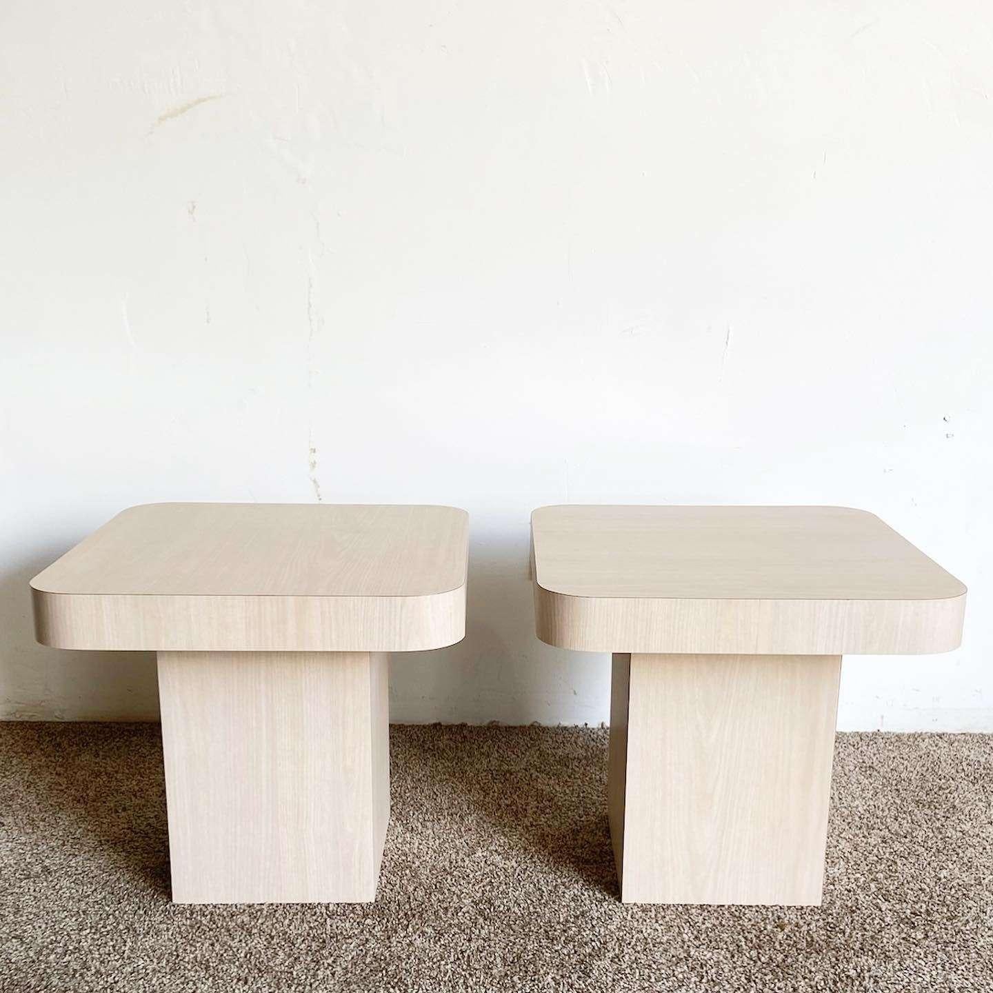 Incredible pair of vintage postmodern mushroom square top side tables. Each feature a washed Woodgrain laminate.
