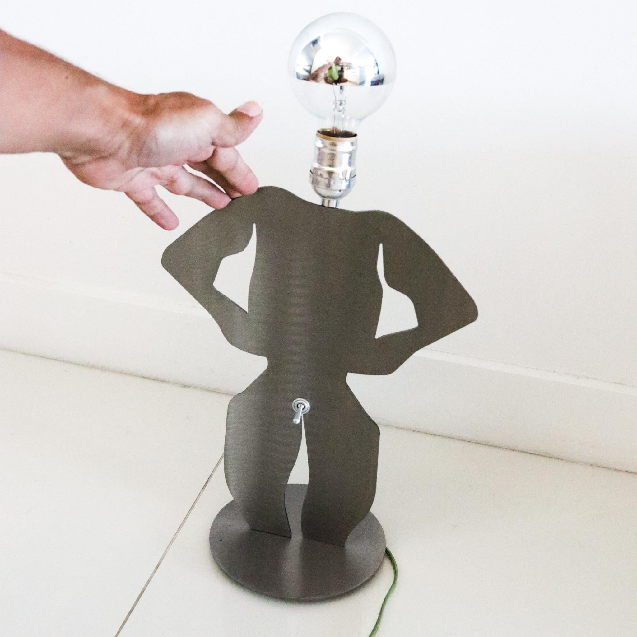 North American Postmodernist 1980 Memphis Pop-Art Lamp In Stainless Steel In The Shape of Man For Sale