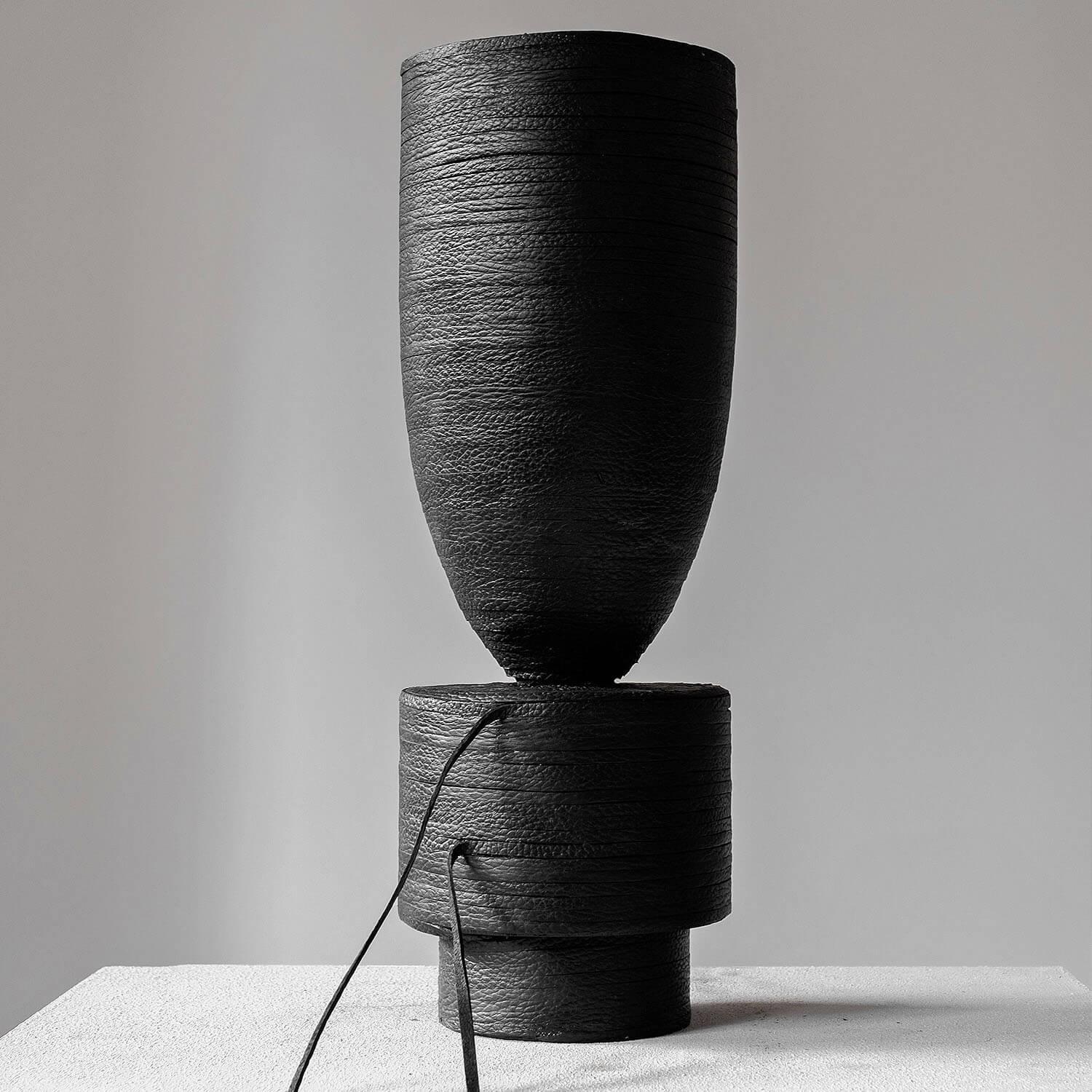 Pot vase leather, Arno Declercq

Measures: 14 cm L x 14 cm W x 40 cm H
5.5” L x 5.5” W x 15.7” H
Material: Iroko wood and leather 
Signed by Arno Declercq.

Arno Declercq
Belgian designer and art dealer who makes bespoke objects with passion