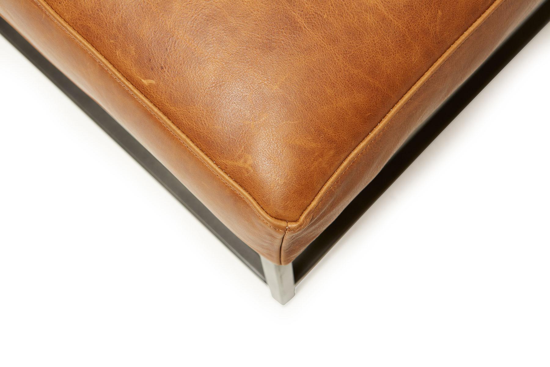 tan leather ottoman