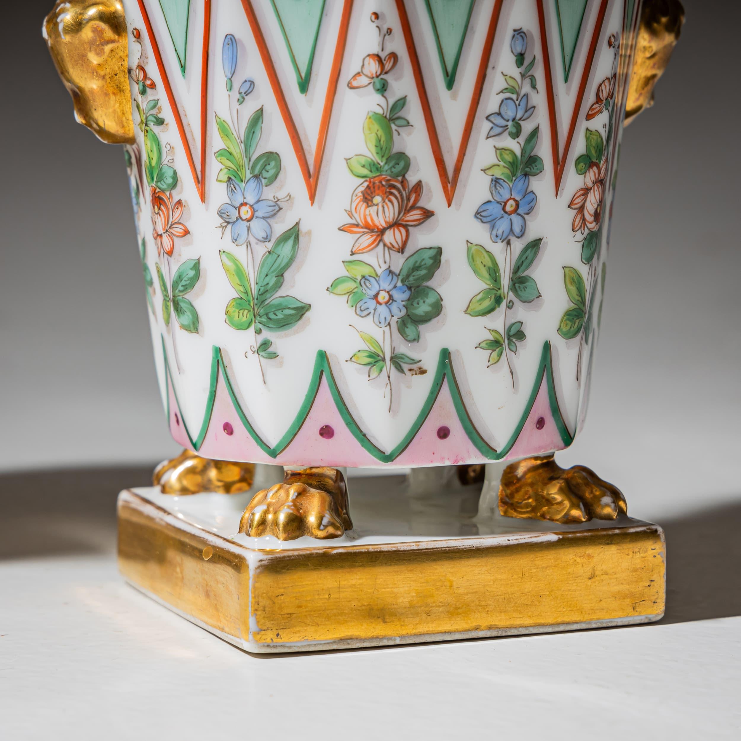 Pair of decorative porcelain potpourri vases, adorned with polychrome gallant scenes in the historicist style. Finely crafted and marked on the underside.