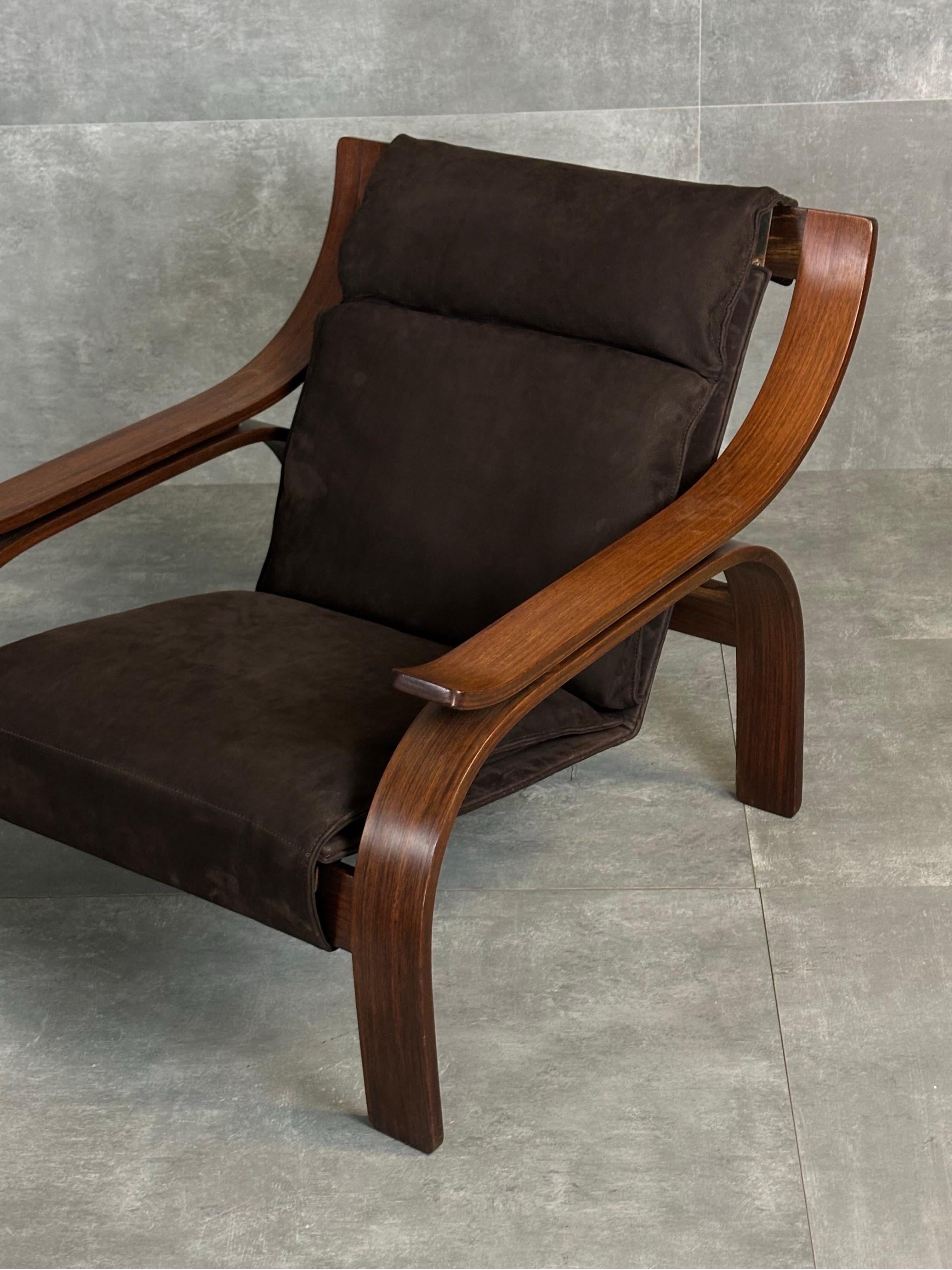 Poltrone “Woodline” designed by Marco Zanuso and produced by Arflex in Italy, in the 1960s. They features a wooden structure and are newly upholstered in brown chamois.
