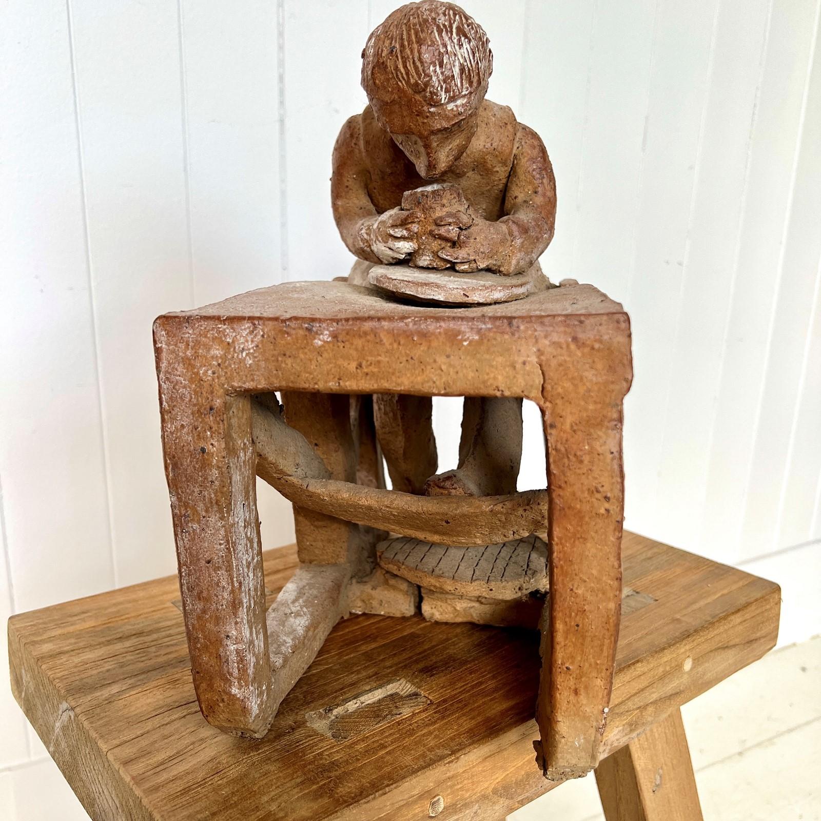 Cuit Sculpture en terre cuite au travail en vente