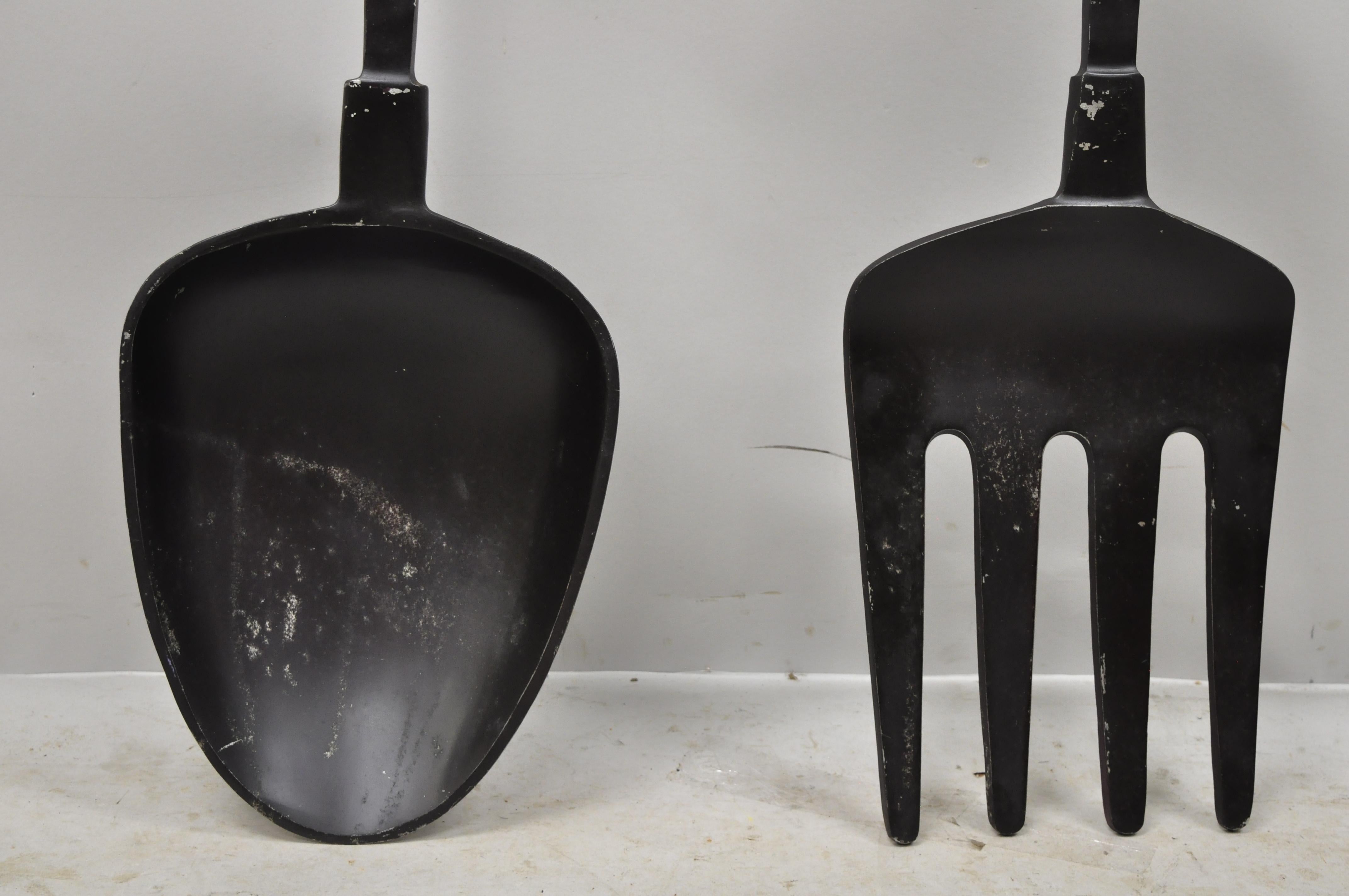 oversized fork and spoon wall decor