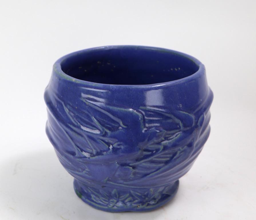 mccoy planter with bird