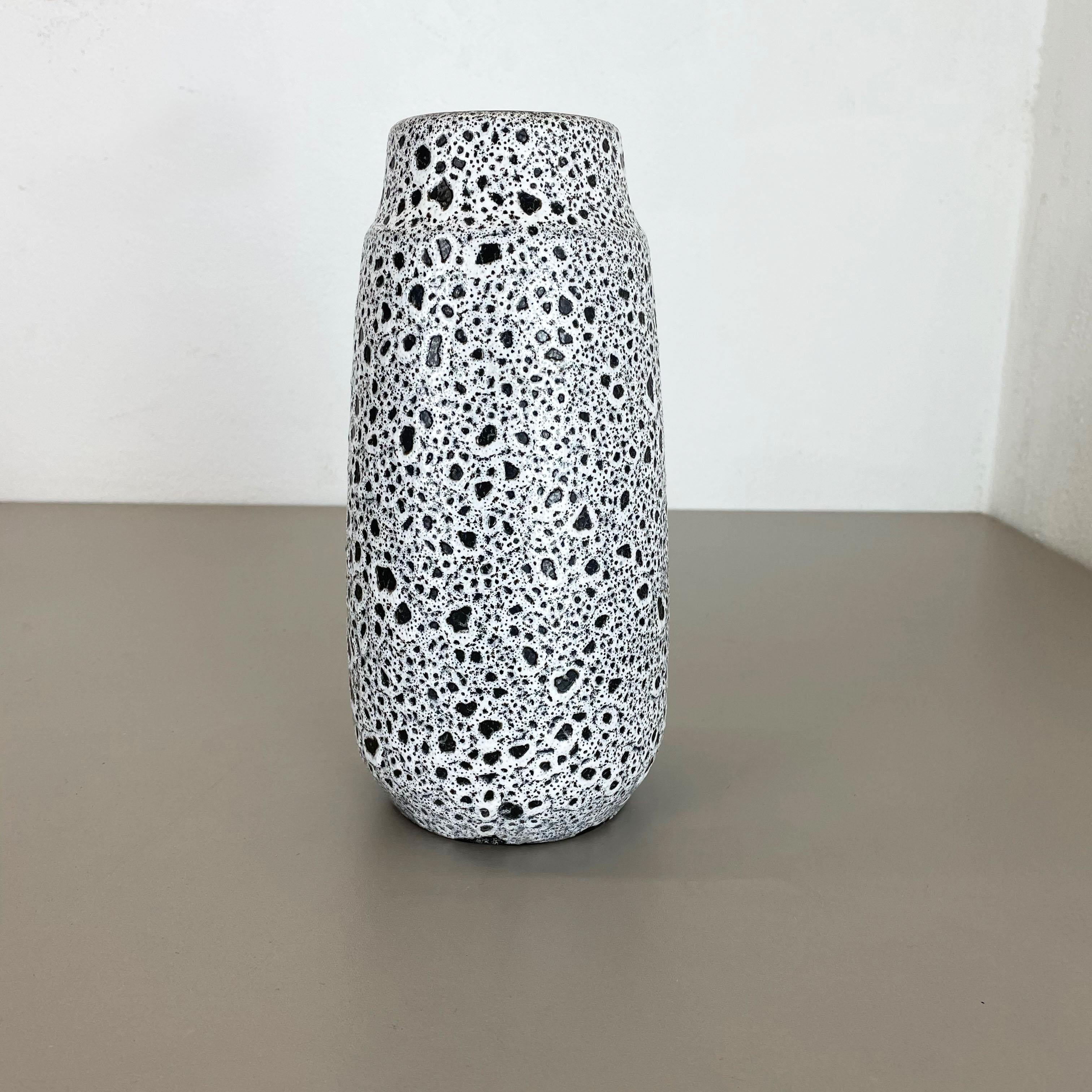 Article:

Fat lava art vase, heavy Brutalist glaze


Producer:

Scheurich, Germany



Decade:

1970s




This original vintage vase was produced in the 1970s in Germany. It is made of ceramic pottery in fat lava optic with abstract