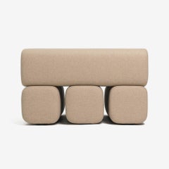 Weißer Ottoman Pouf Drova 6 von WOO - Weicher skulpturaler Sitz für die Leseecke