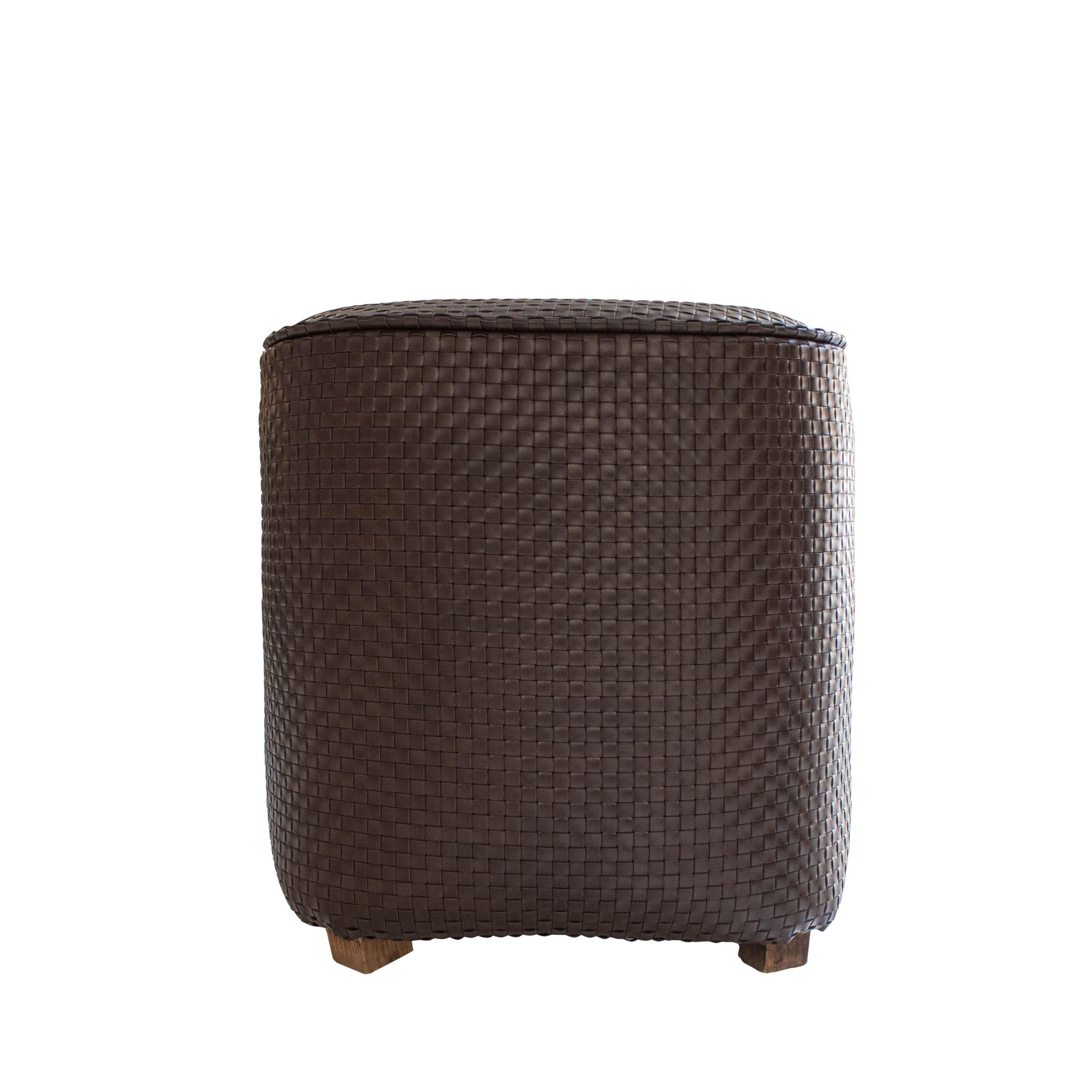 Square pouf with rounded edges, solid wood structure, upholstered in chocolate-colored woven faux leather fabric. 