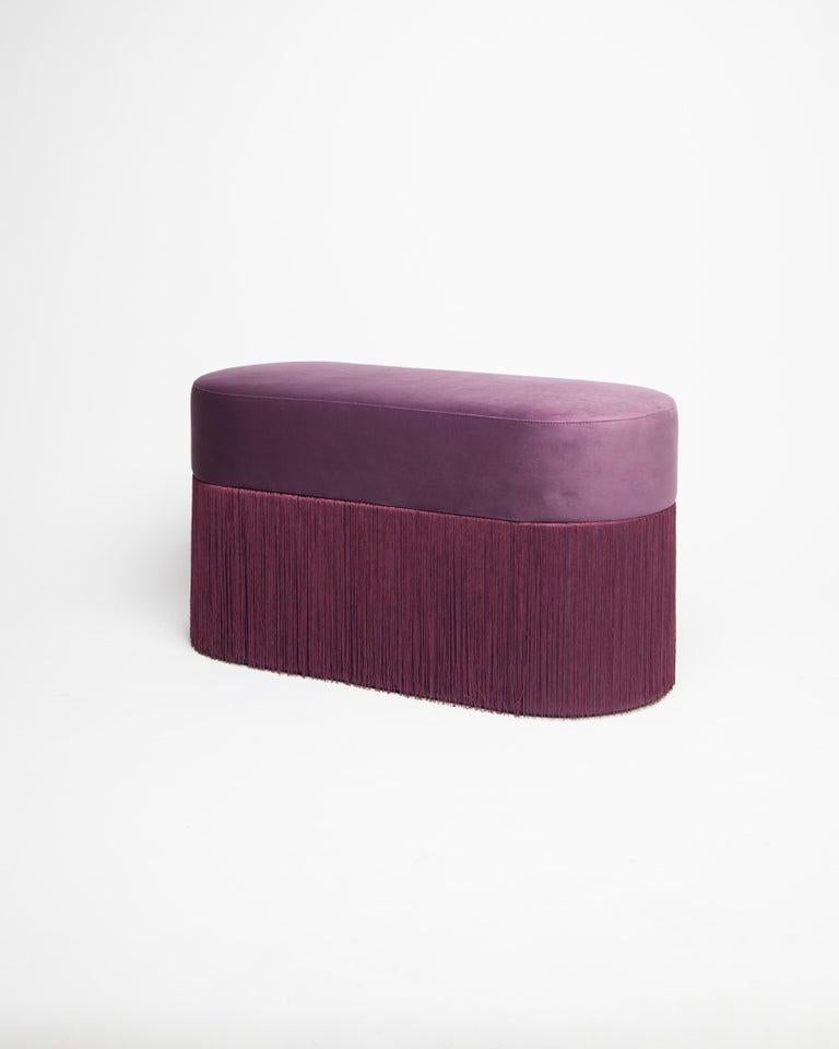 Pouf Pill L Contemporary Sculptural Pouf with Velvet and Fringes by Houtique
Dimensions: H 45 x 80 x 35 cm
Materials: Velvet upholstery and 30cm fringes

Pill Pouf L
Art-deco style pouf with wood structure and velvet fabric.
2 fiber-board discs of