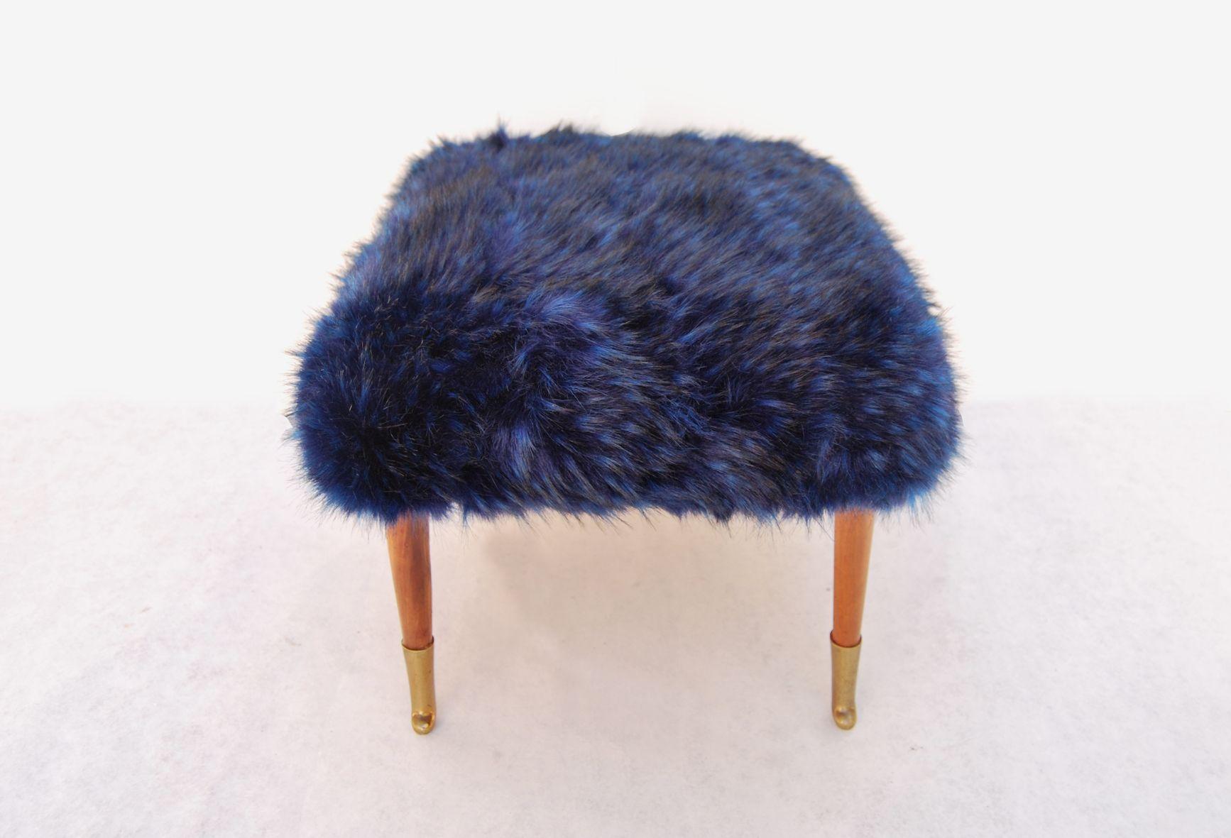 1940s footstool pouf. 
Covered with faux fur/faux fur from the 1970s, blue color. 
The price of shipping is for the Italian territory, for the islands and for shipping abroad quote on request. 
Customs expenses are to be paid by the recipient. 
