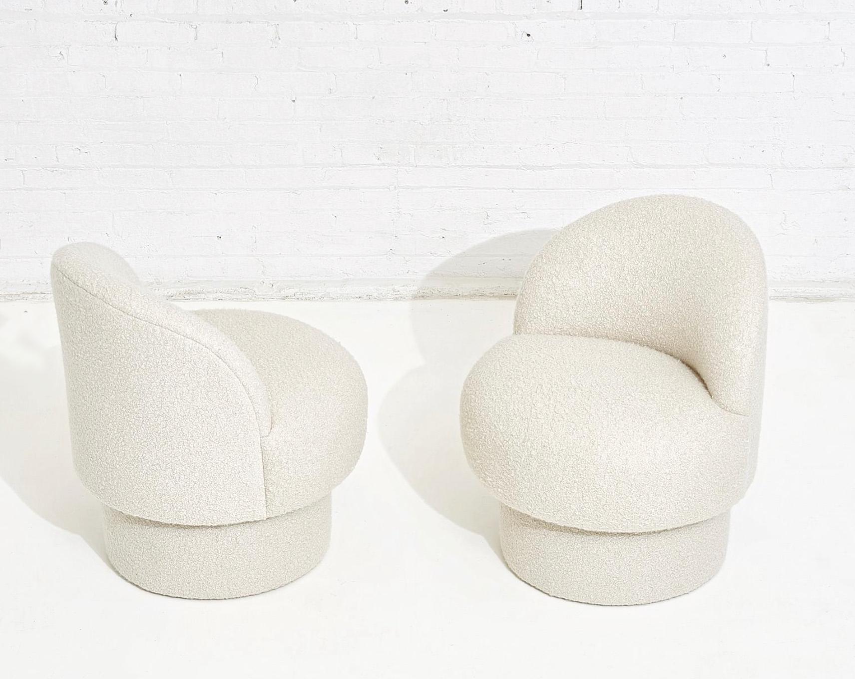 Upholstered in white performance boucle. These are customizable. COM upholstery option available as well.