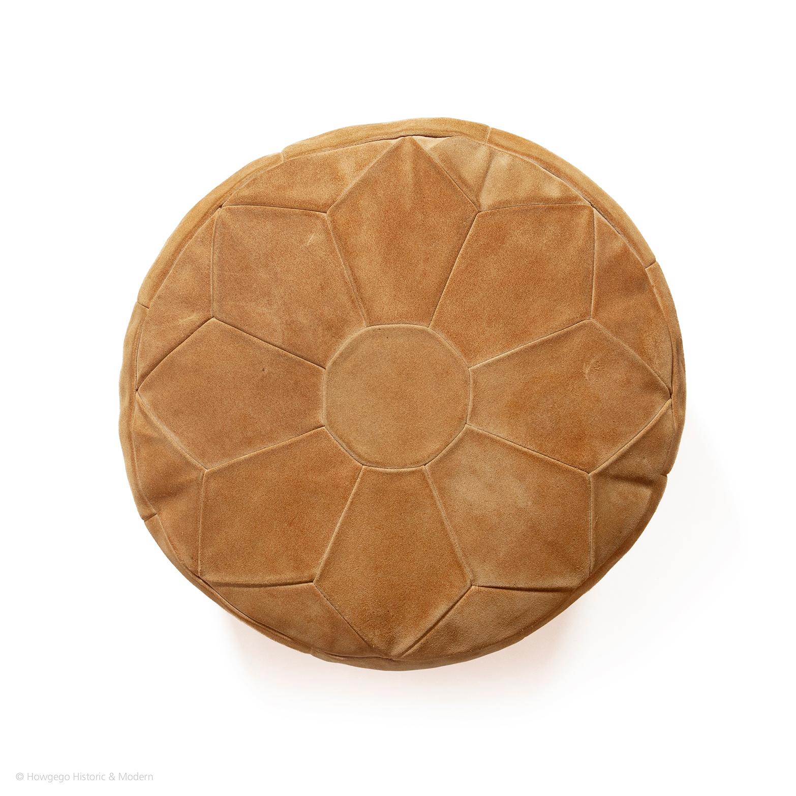 - Robust and fun Mid-Century Modern accenting piece
- Great for seating additional guests or as a footrest
- Stylish design
- Robust hard wearing suede

A vintage 1950s, pale, brown or beige, suede, small, 'barrel' pouffe. The top decorated