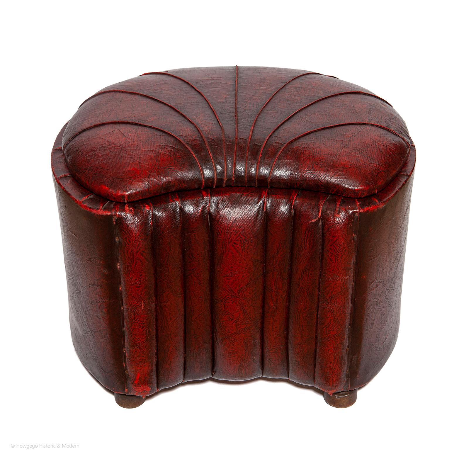 - Rare Art Deco period stool with internal storage space
- Beautiful scallop shape form and seat decoration, with architectural front
- Rich burgundy color with a lustrous patina

The scallop shaped lift-up seat defined with self-piping.