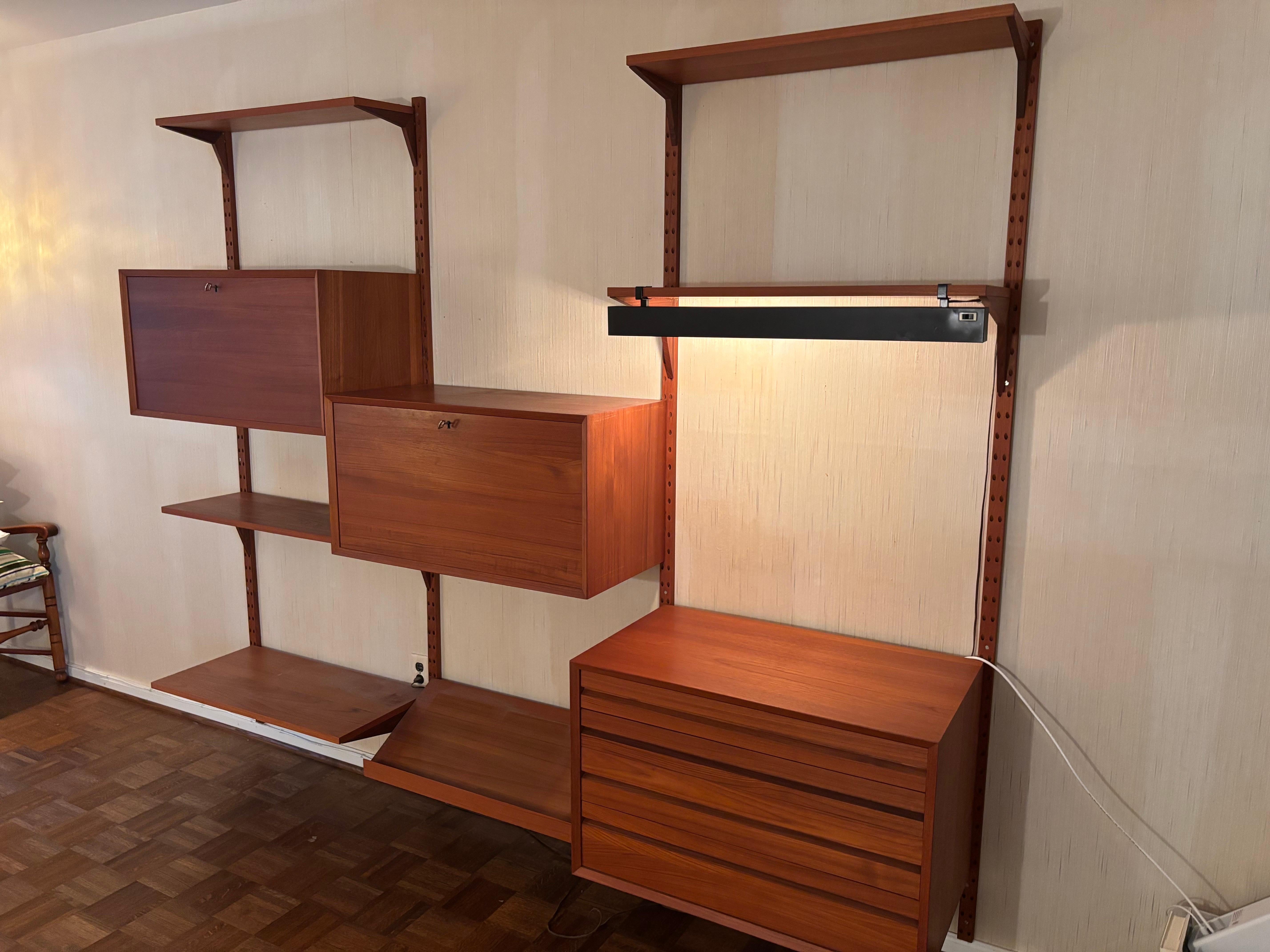 Scandinavian Modern Poul Cadovius 3 Bay Teak Wall Unit with Rare Light! For Sale