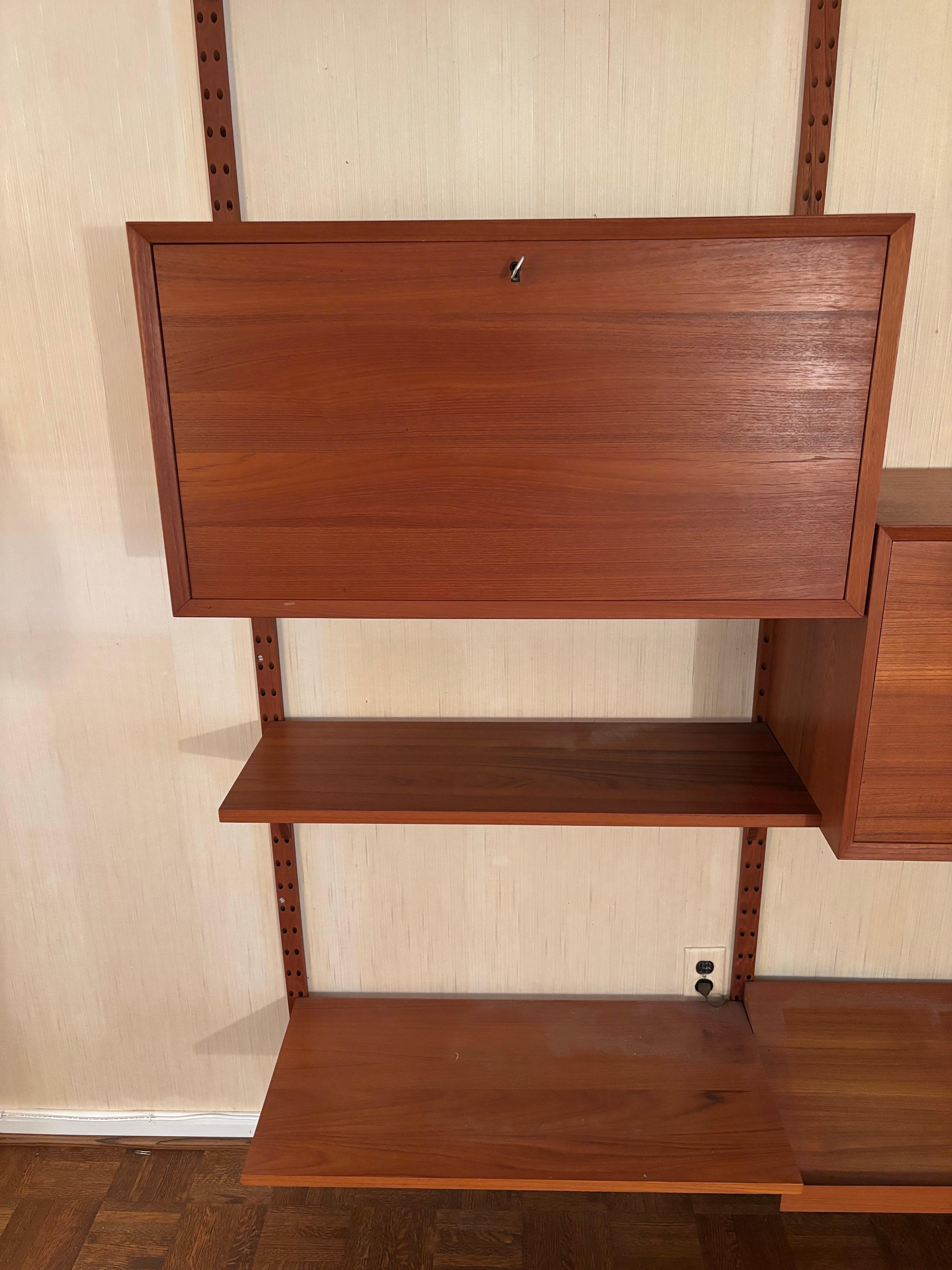 Poul Cadovius 3 Bay Teak Wall Unit with Rare Light! In Good Condition For Sale In Philadelphia, PA