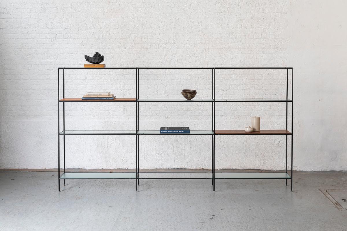3-Piece Abstracta shelving unit designed by Poul Cadovius and produced in Denmark around 1960. This unit consist of black lacquered steel pipes, 2 types of glass shelves and teak wooden veneer shelves. The placements of these surfaces can be