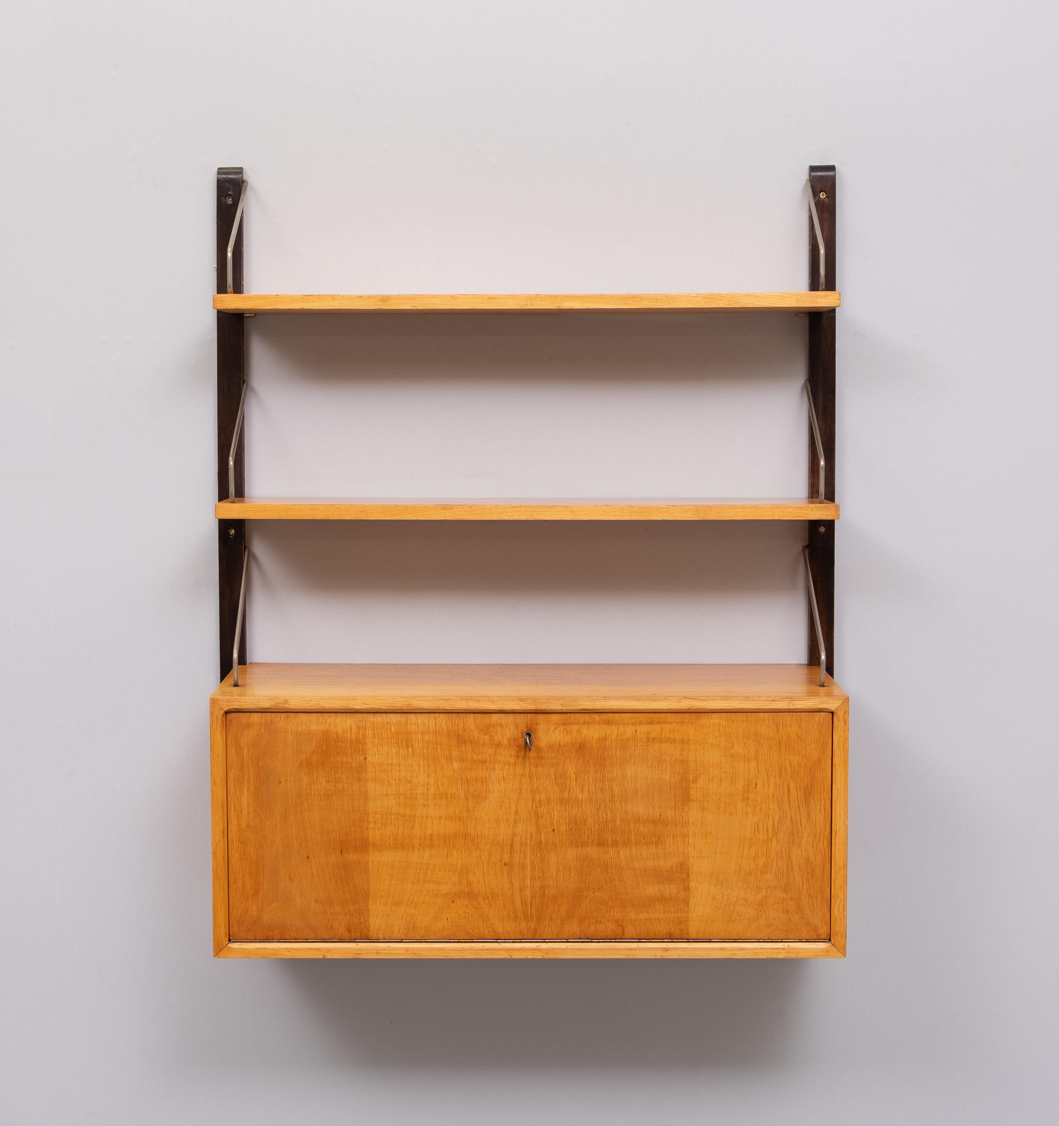 Very nice Beechwood Wall unit .Design by Poul Cadovius 
for Royal system . 1950s Denmark  Ideal working space .with this Cabinet .
and Two shelves .Great Color .original key . 