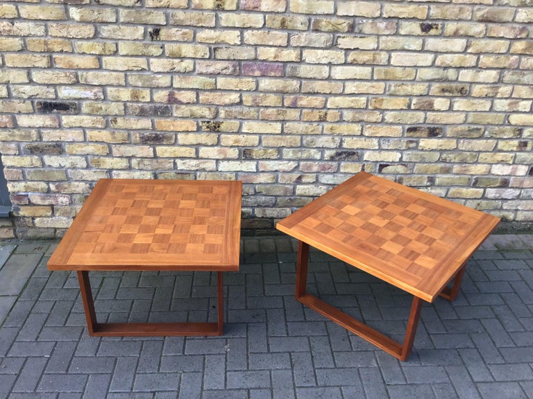 Beautiful pair of side tables with a playing surface in rosewood and teak inlay. Simple flexible design circa 1960s by Poul Cadovius 
for France & Son.
 