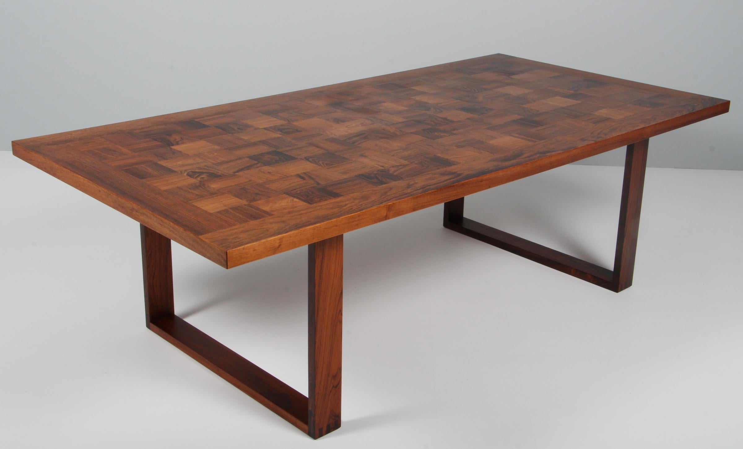 Poul Cadovius coffee table in partly solid rosewood, chess pattern.

Made by France & Son.