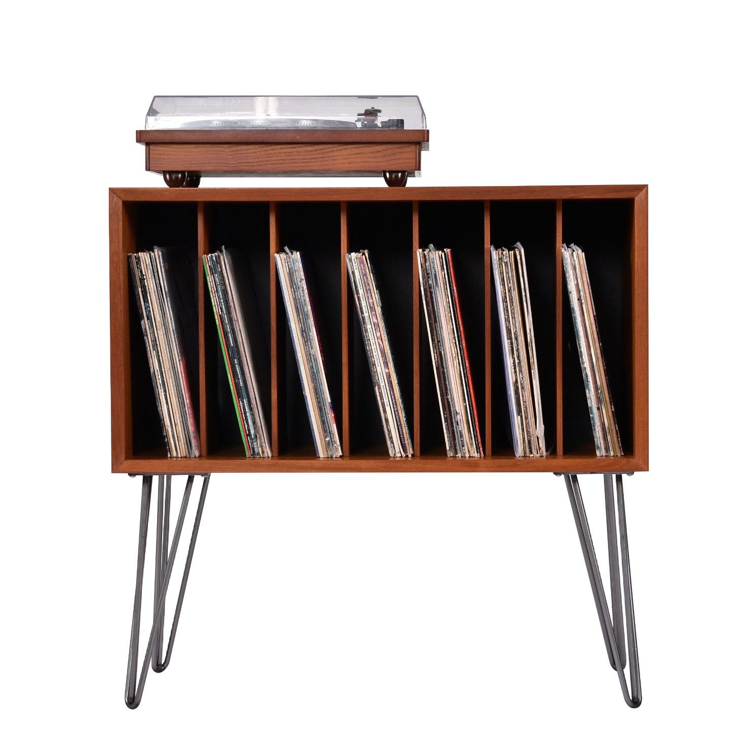 Stunning Poul Cadovius Danish teak record cabinet on hairpin legs.Our shop elevated (literally) this Cado Cabinet with a sleek set of 14? metal hairpin legs. Instead of going the easy route with screws, we opted to install 12 threaded insert nuts.