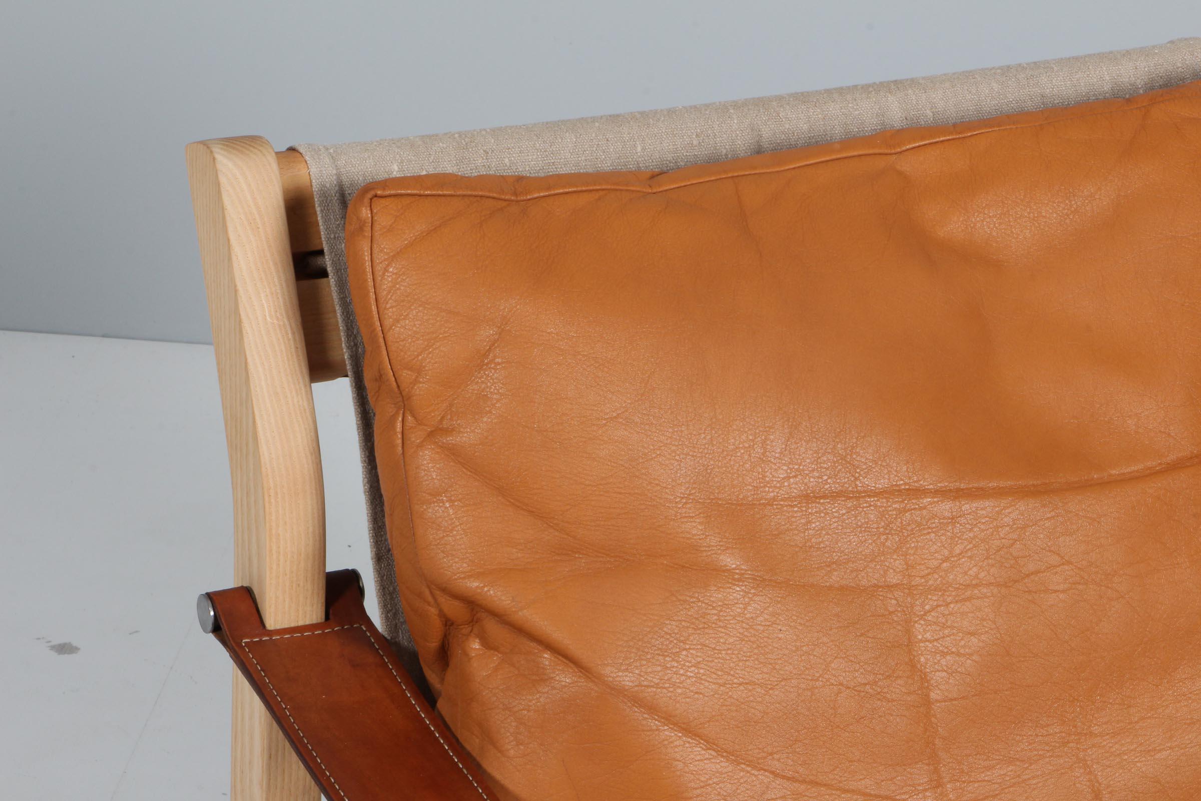 Scandinavian Modern Poul Cadovius lounge chair of Ash, Aniline Leather, Canvas and Saddle Leather