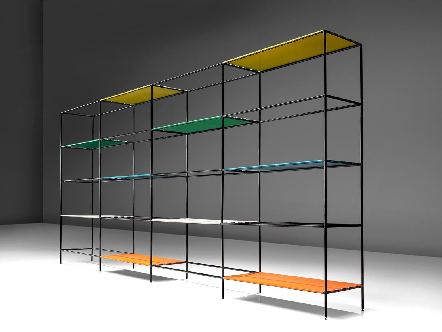 Poul Cadovius for Royal System, shelving unit, steel and mulitcolored glass, Denmark, 1960

This minimalist shelving unit was designed by Poul Cadovius. The modular system exists of a black lacquered metal frame. Colorful metal shelves are adding