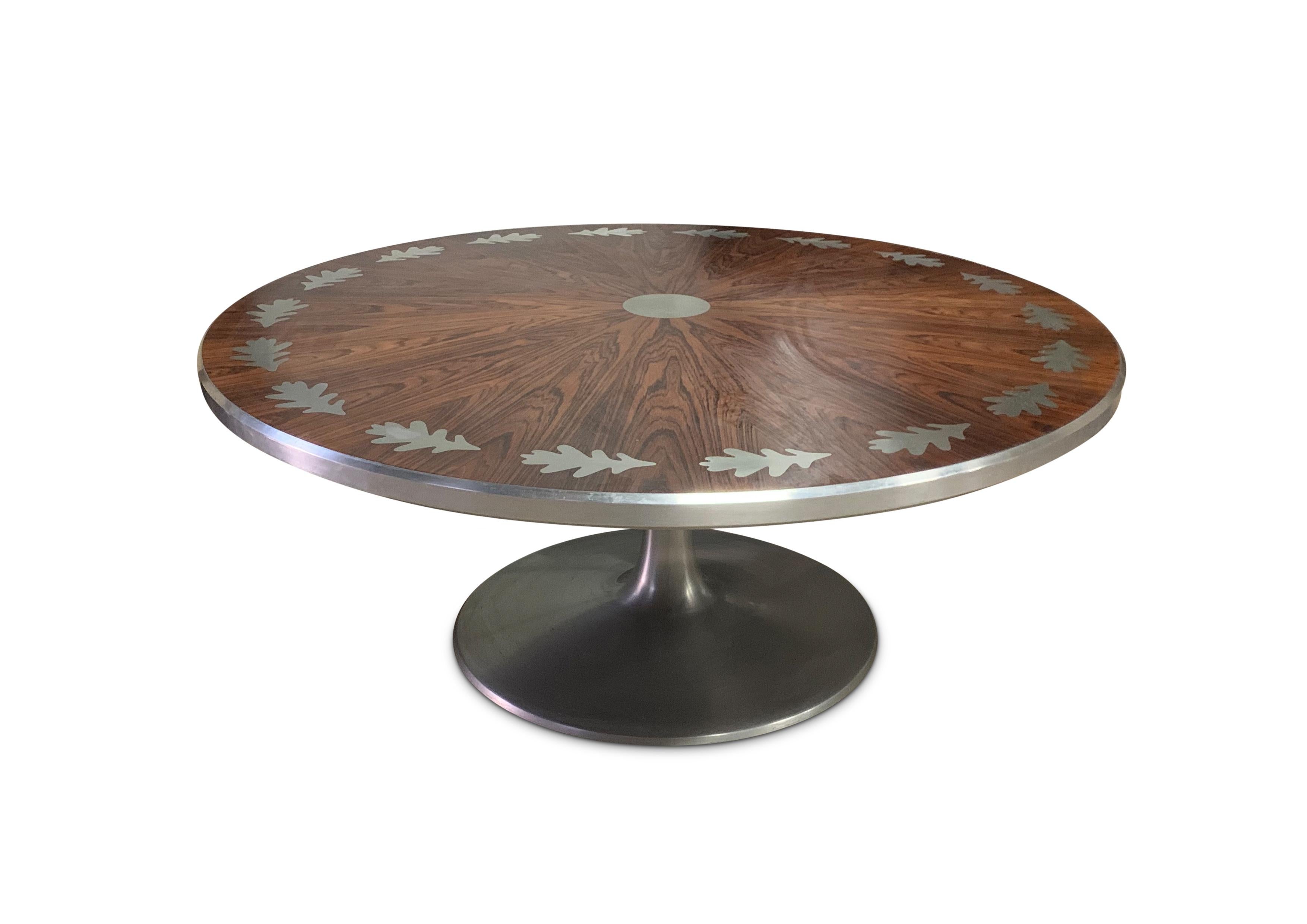 Poul Cadovius Rosewood Coffee Table Designed For France & Son Circular Top Inlaid With Brushed Chrome Floral Decoration Made In Denmark 1960's

Poul Cadovius (1911 - 2011) was one of the most colourful and successful persons in the history of