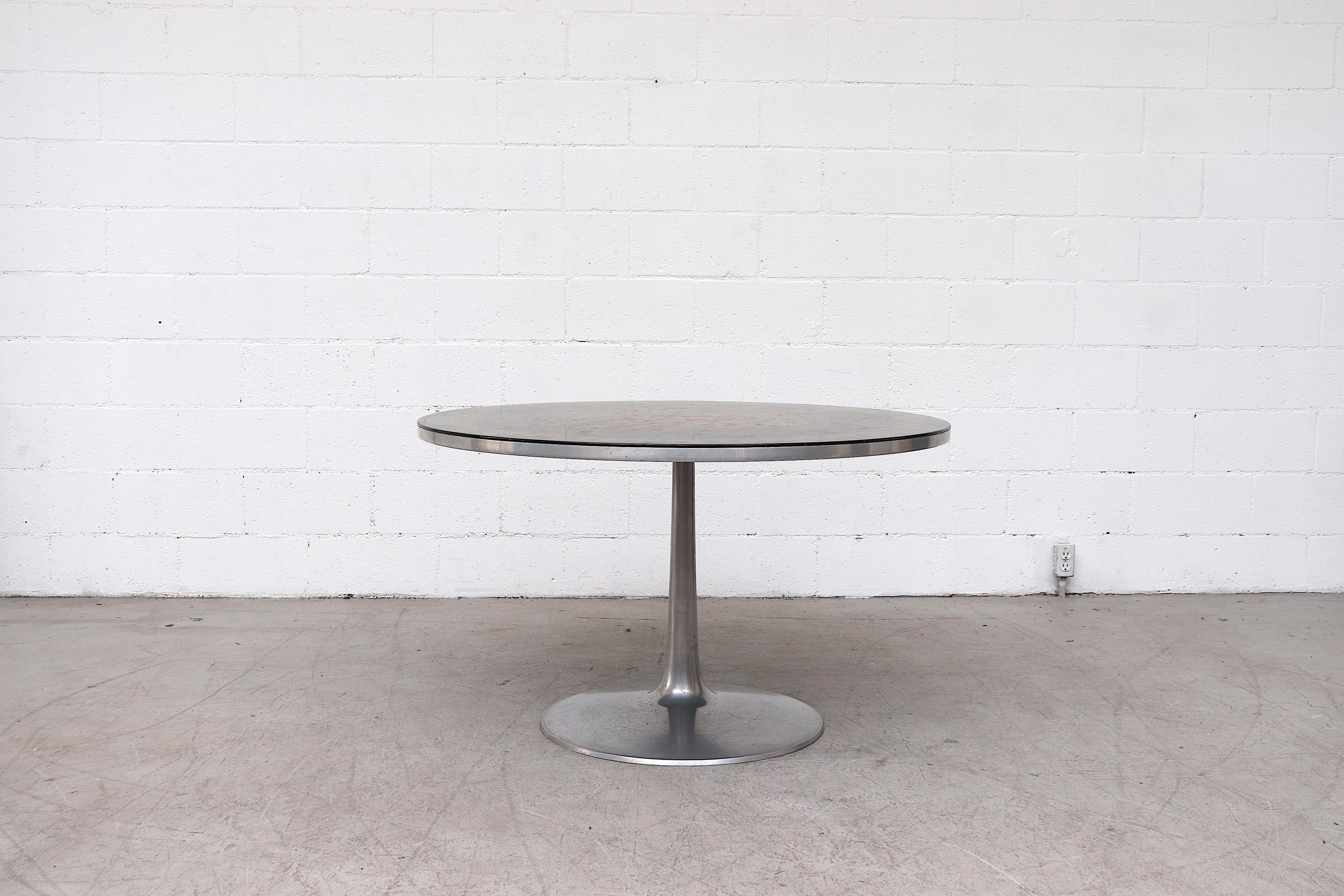 Impressive Poul Cadovius dining or center table with striking ornate surface with an aluminum pedestal base. In original condition with some wear and visible scratching consistent with use and age. Other sizes (LU922418398332, LU922418398202) and