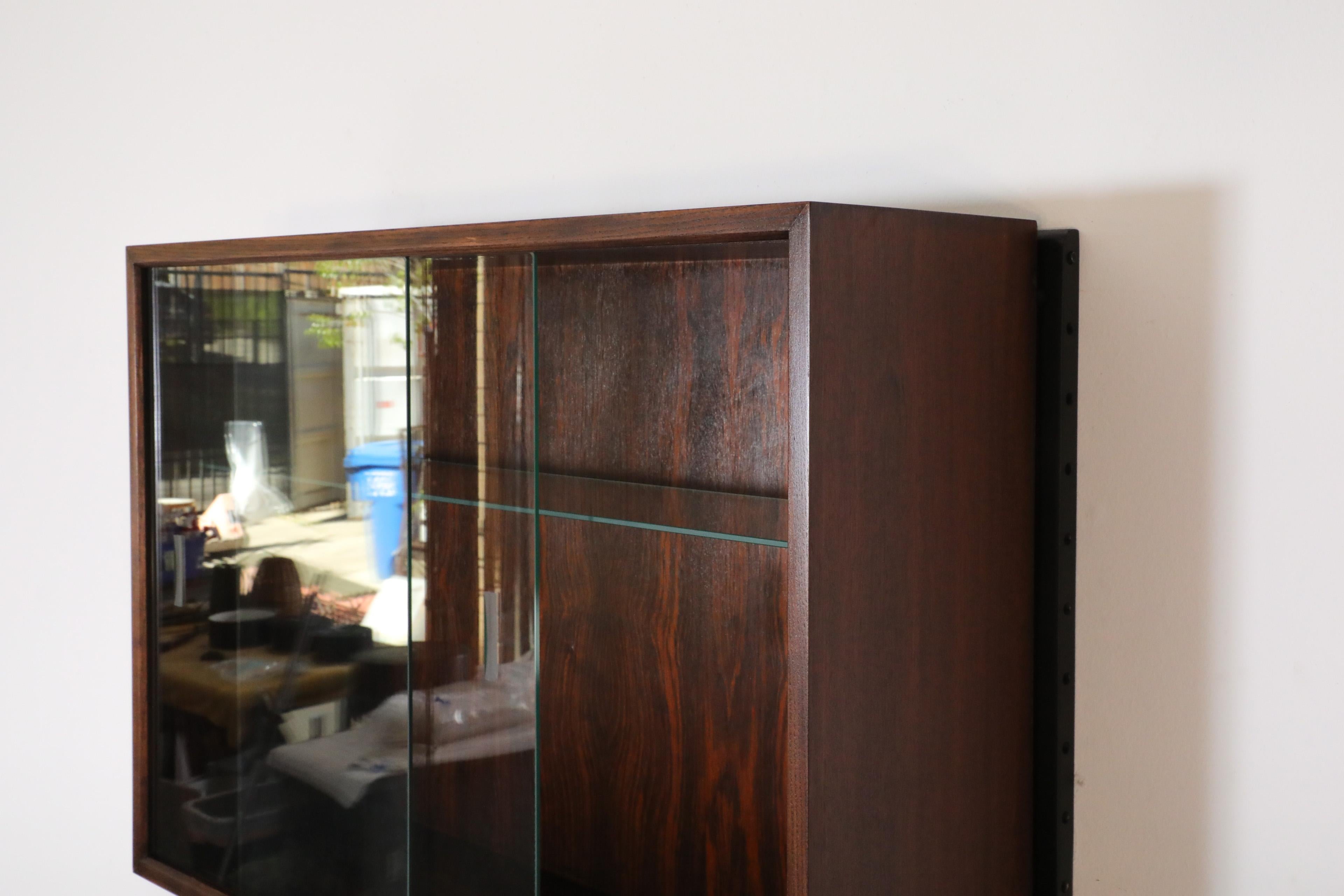 Poul Cadovius Royal Rosewood Wall Mount Sliding Glass Front Cabinet and Shelving For Sale 2