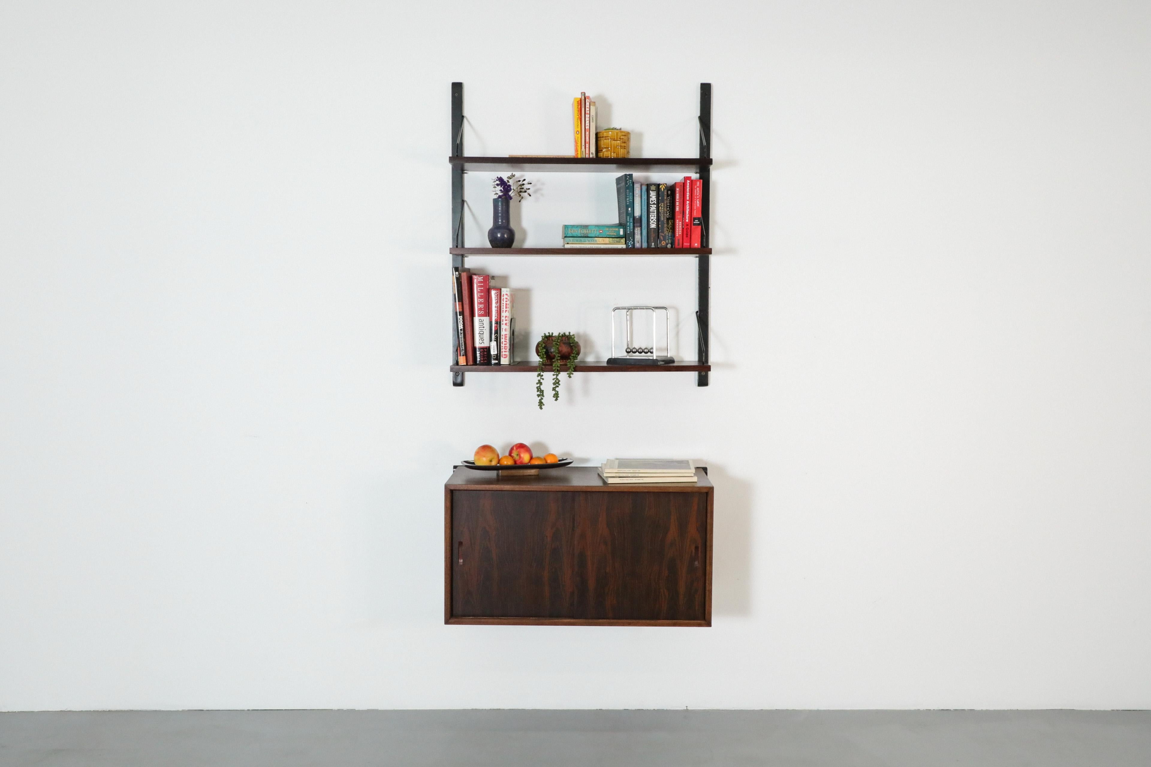 Mid-Century Modern Poul Cadovius Royal Shelving Rosewood Wall Mount Shelving Unit and Cabinet For Sale