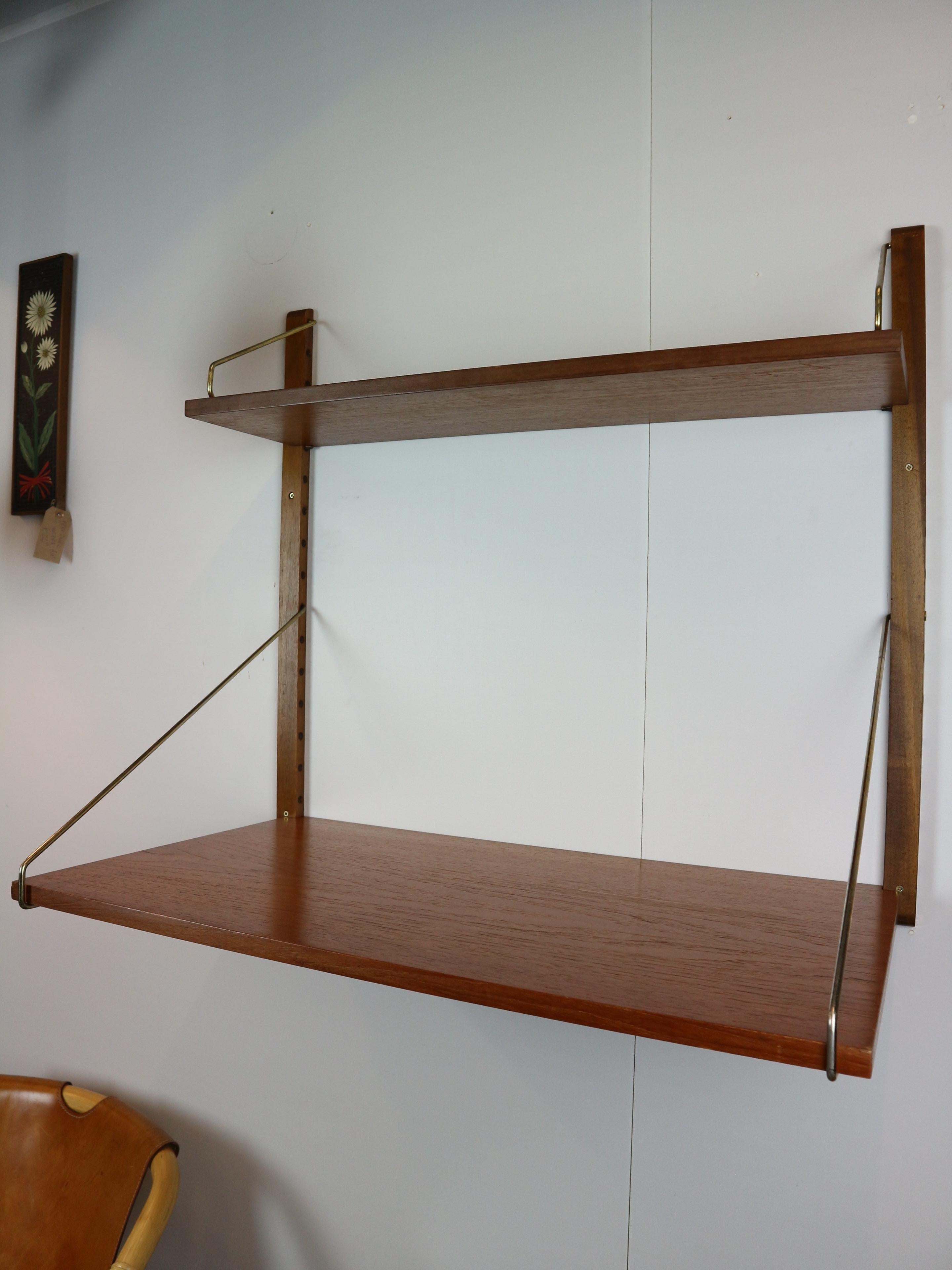 Scandinavian Modern Poul Cadovius 'Royal System' teak desk shelf and brass brackets, 1960s Denmark