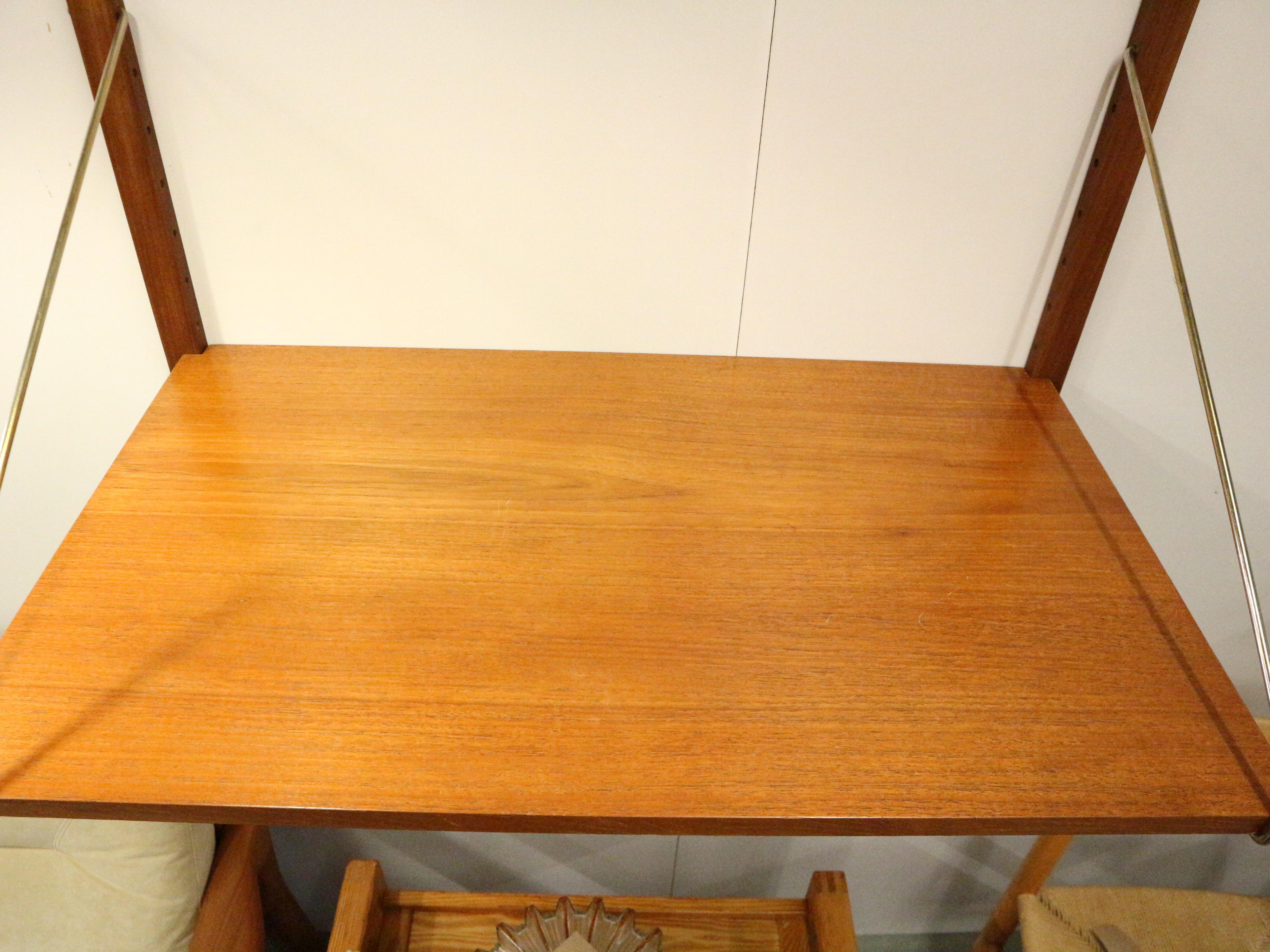 20th Century Poul Cadovius 'Royal System' teak desk shelf and brass brackets, 1960s Denmark For Sale