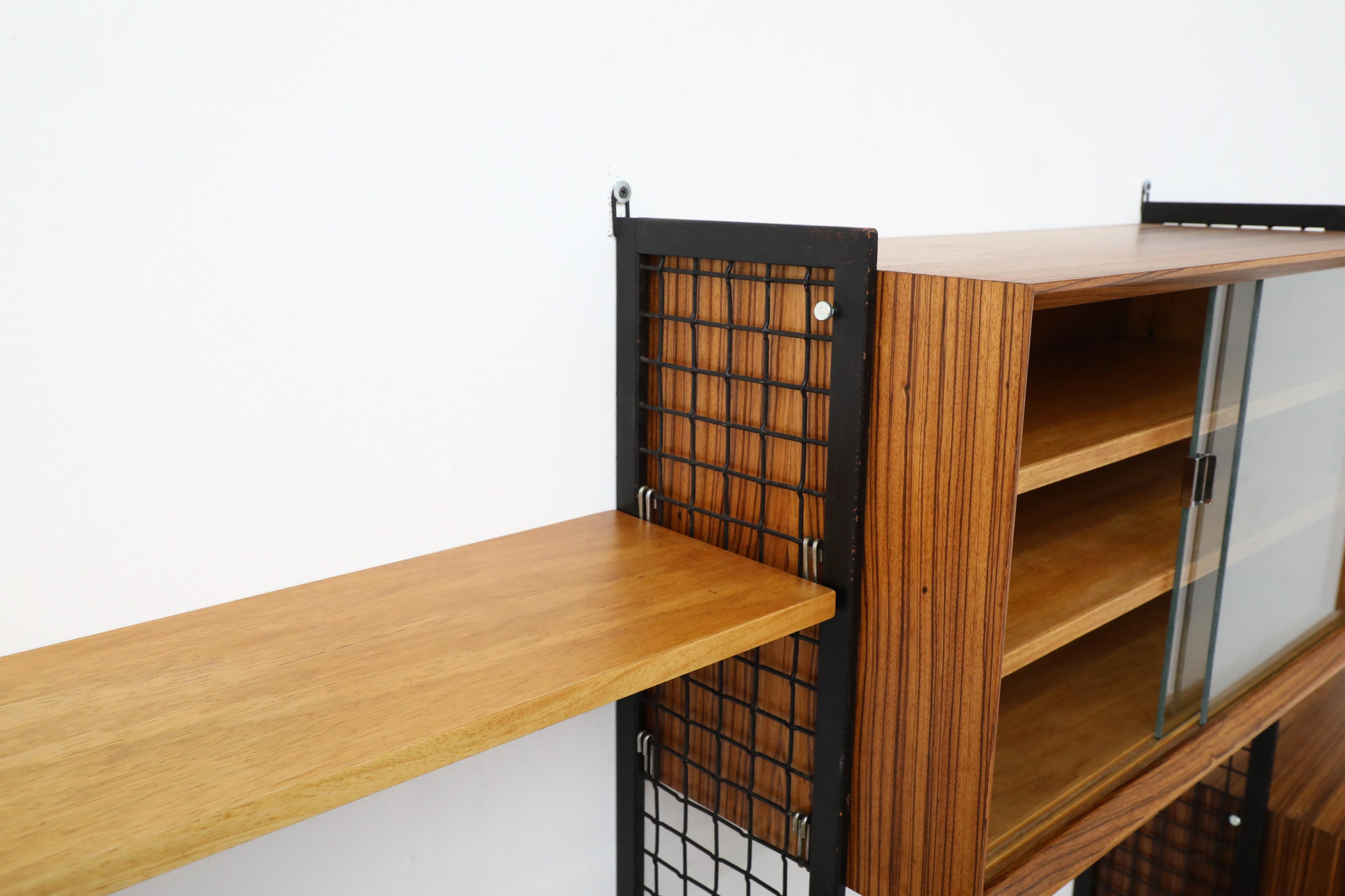 Poul Cadovius Style Mixed Wood Wall Unit with Black Enameled Metal Grid Risers 7