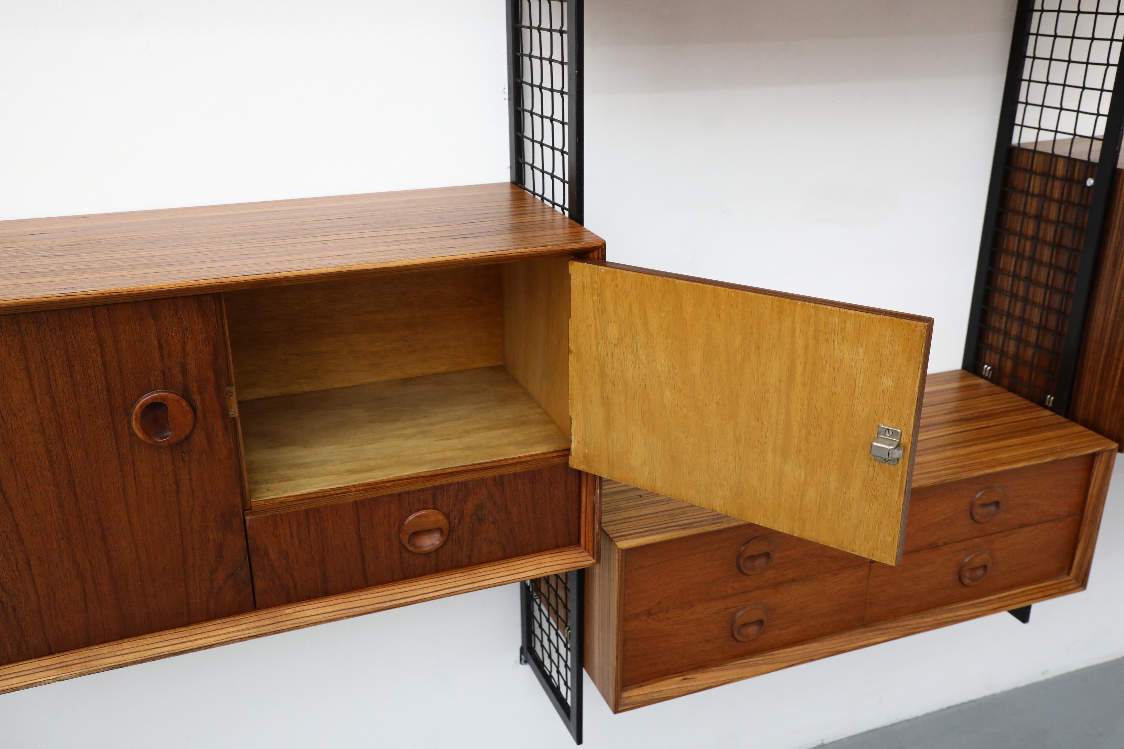 Poul Cadovius Style Mixed Wood Wall Unit with Black Enameled Metal Grid Risers 10