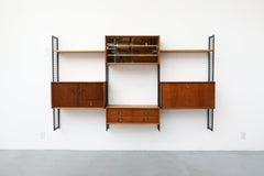 Poul Cadovius Style Mixed Wood Wall Unit with Black Enameled Metal Grid Risers