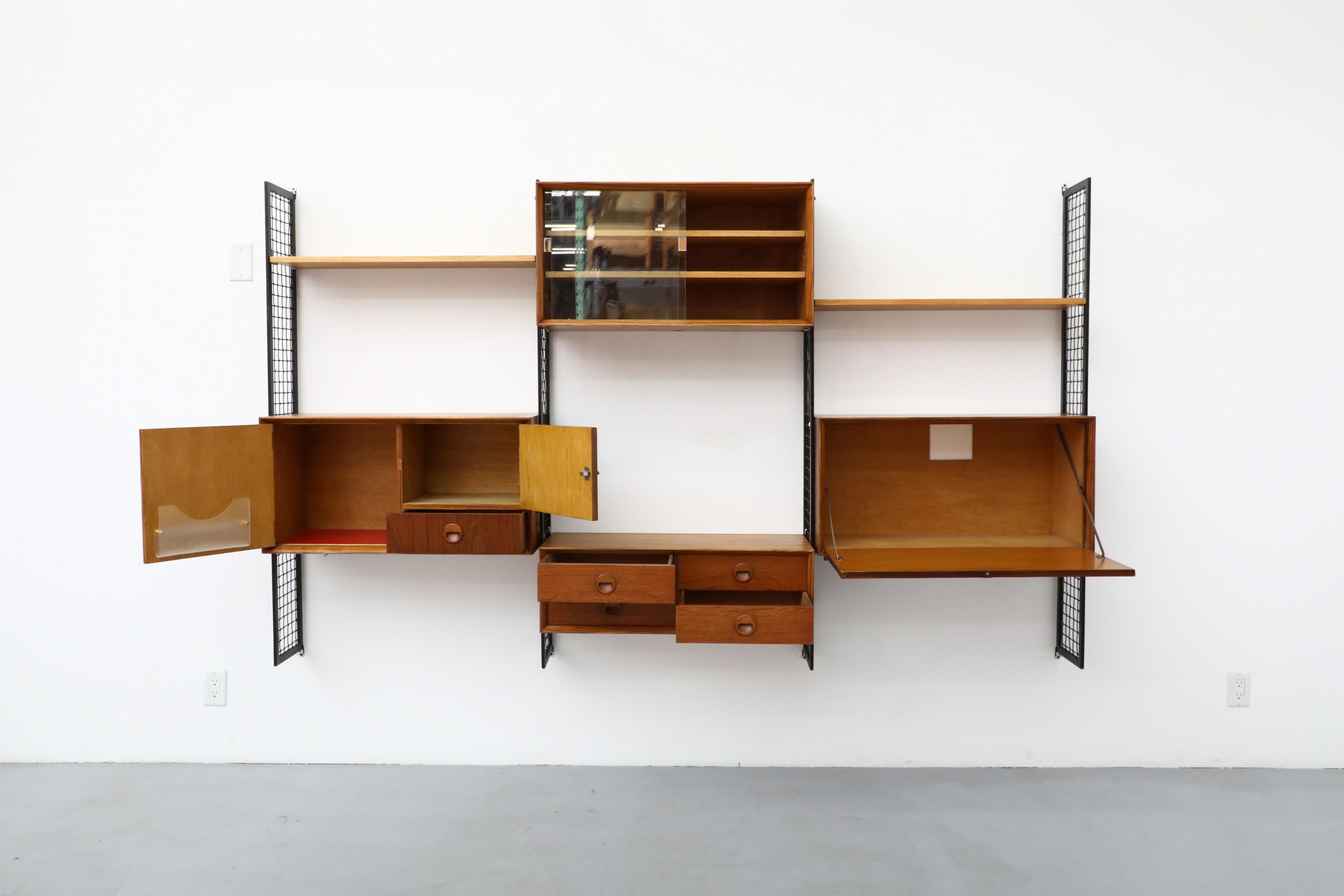 Danish Poul Cadovius Style Mixed Wood Wall Unit with Black Enameled Metal Grid Risers