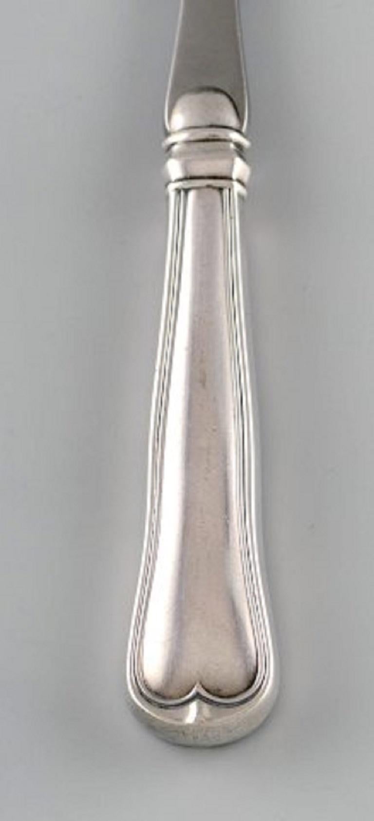 Poul Frigast, Danish silversmith. Old fluted salad set in silver, circa 1930.
In very good condition.
The spoon measures: 20 cm.
Stamped: PF and three towers.
  