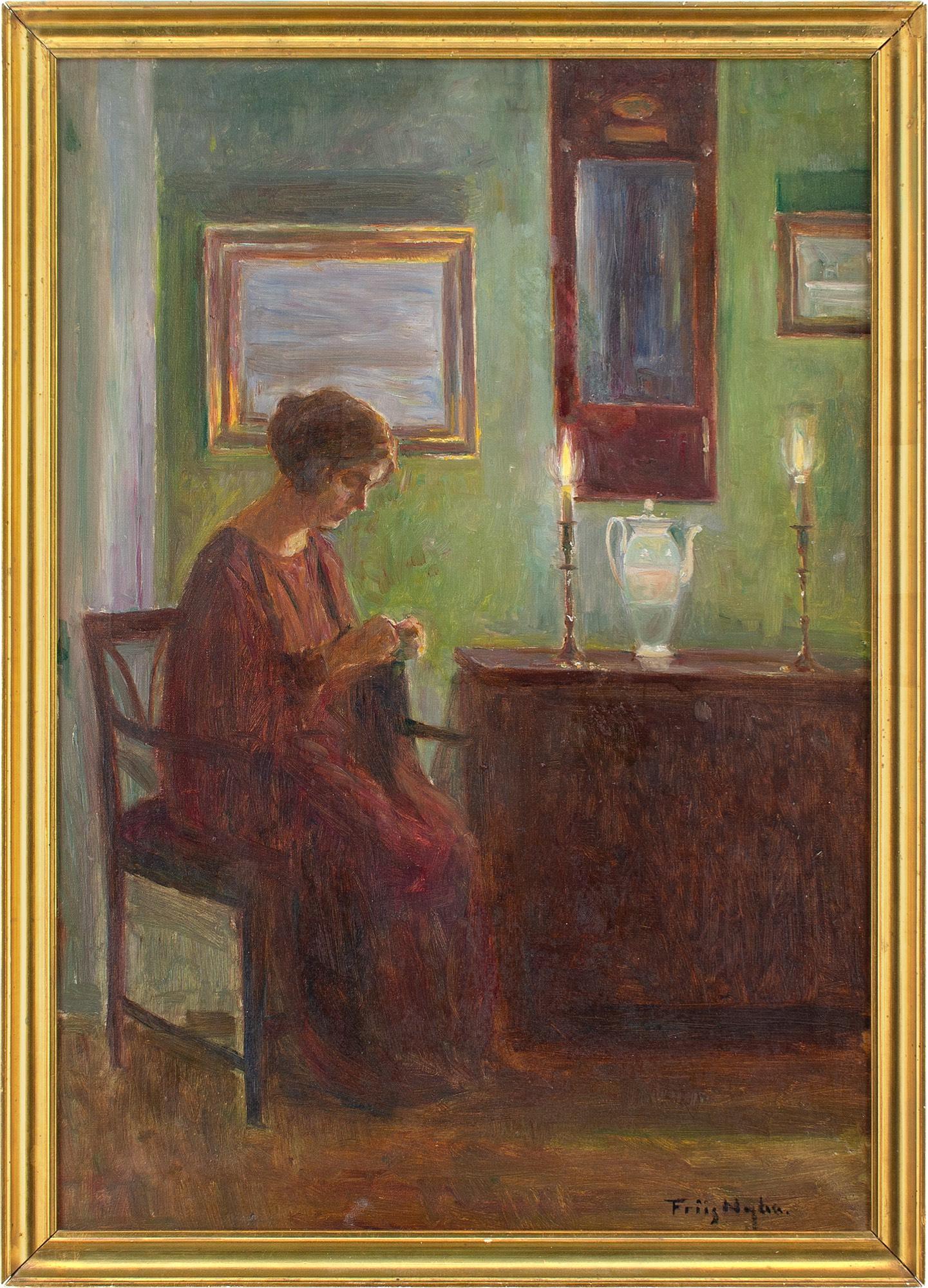 This early 20th-century oil painting by Danish artist Poul Friis Nybo (1869-1929) depicts a woman sewing within a candlelit interior.

Nybo favoured the quiet moments of domestic introspection that would otherwise pass us by. Candles flicker