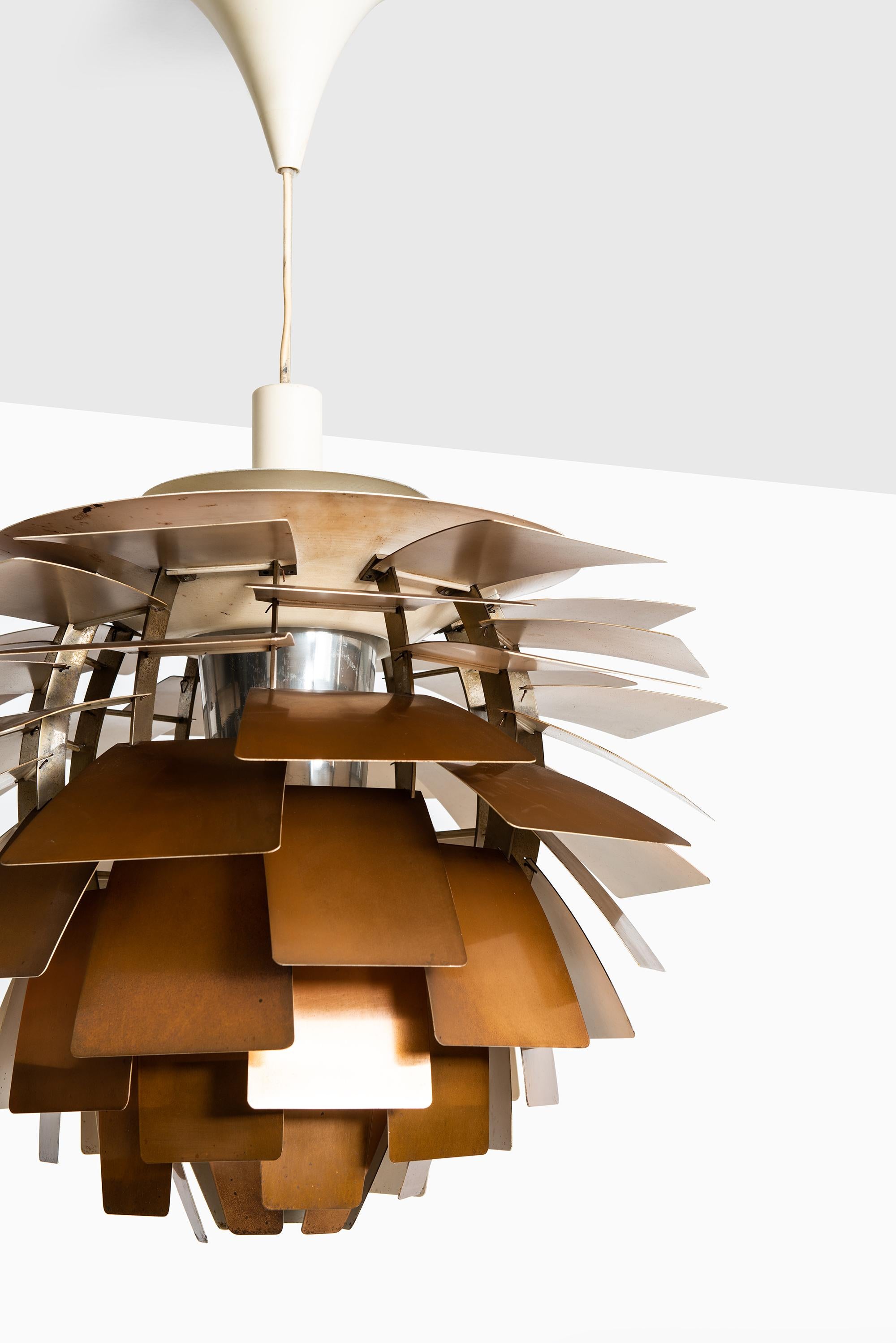Rare first edition artichoke ceiling lamp designed by Poul Henningsen. Produced by Louis Poulsen in Denmark.