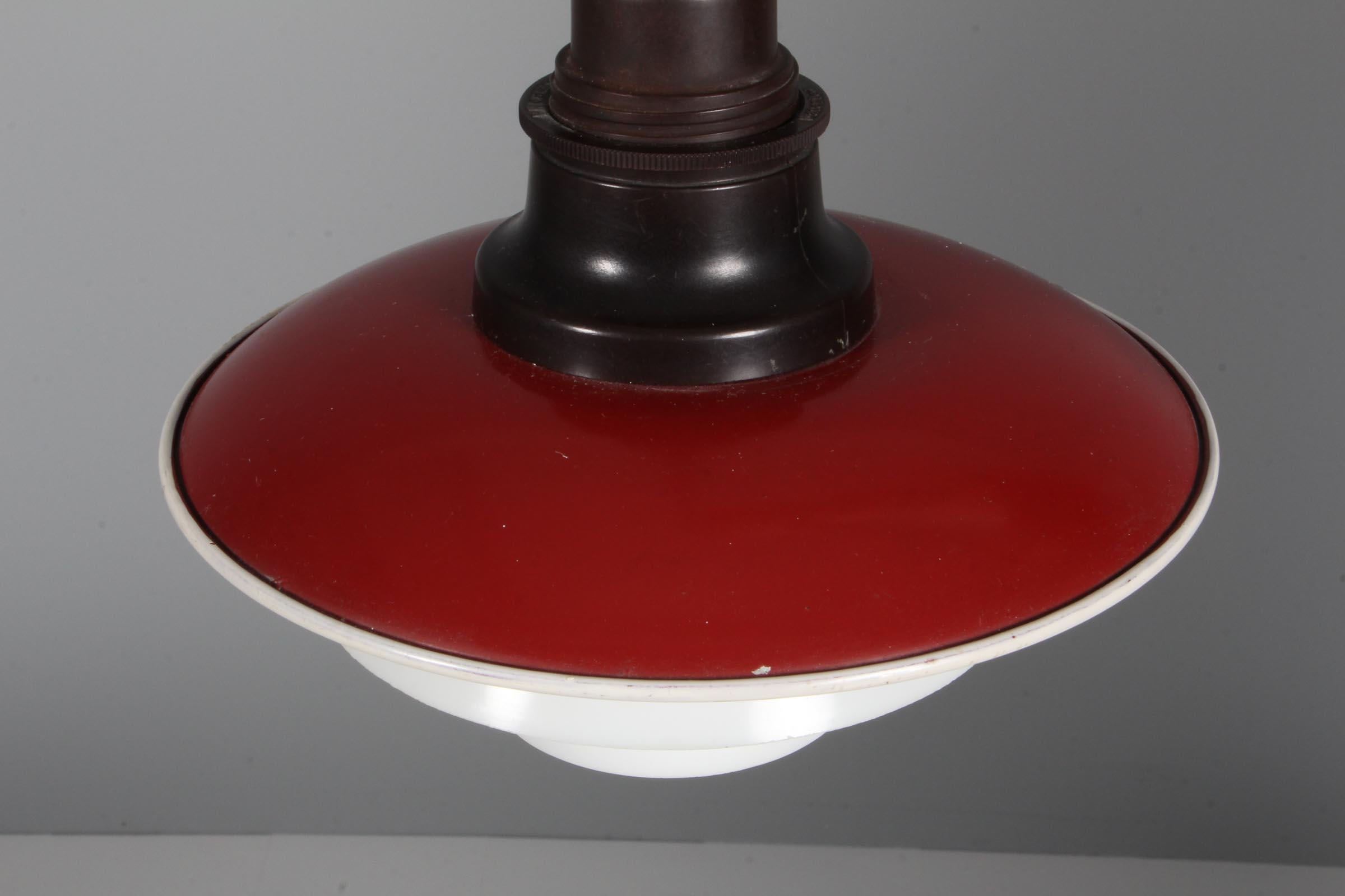 Poul Henningsen PH 2/2 pendant lamp. Shade of white and red laquered copper. Middle and bottom shade of frosted glass. 

Marked Patented, made by Louis poulsen in the 1930s.