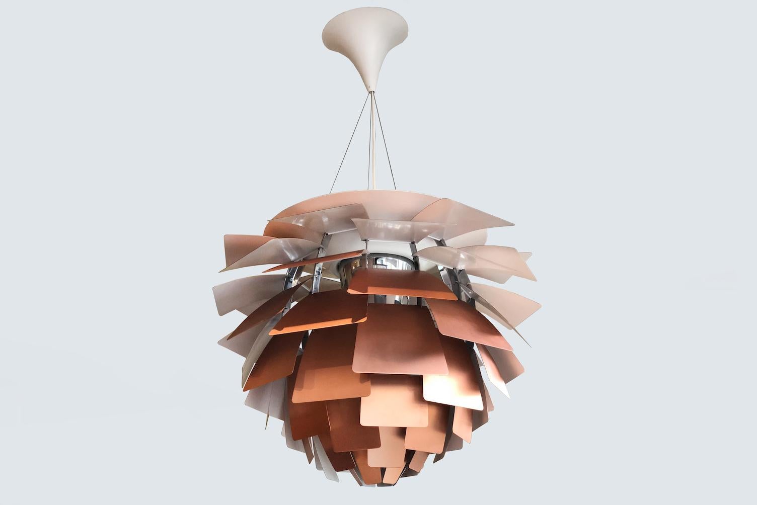 Poul Henningsen for Louis Poulsen, artichoke lamp with 72 copper leaves, originally designed circa 1958 for the Langalinie Pavillion in Copenhagen.
Shown here the large 72 cm version.