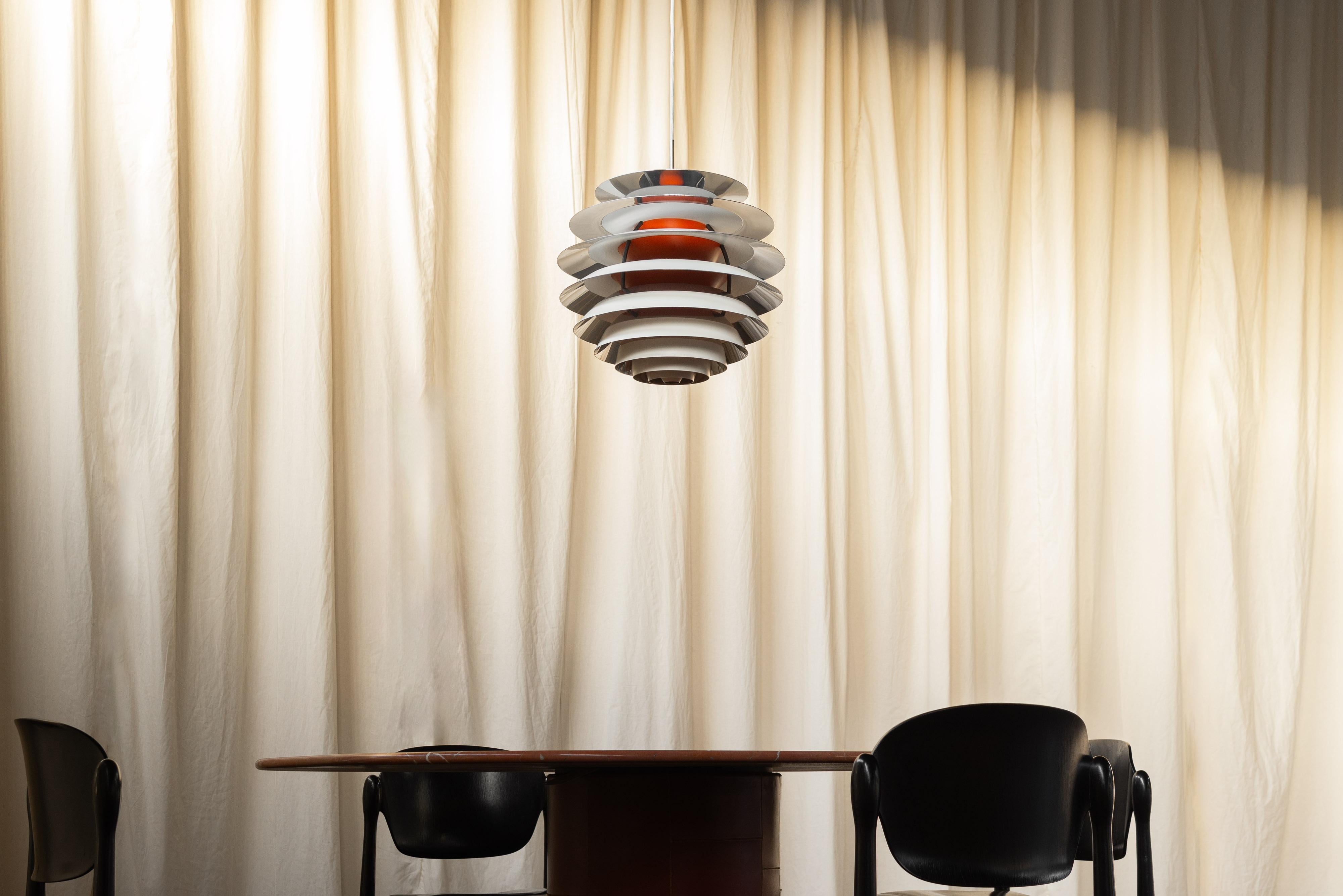 Nice pair of so called 'Contrast' chandeliers designed by Poul Henningsen and manufactured by Louis Poulsen in Denmark, 1962. The PH Contrast pendant lights are a special find for collectors because they're not made anymore. They were designed by