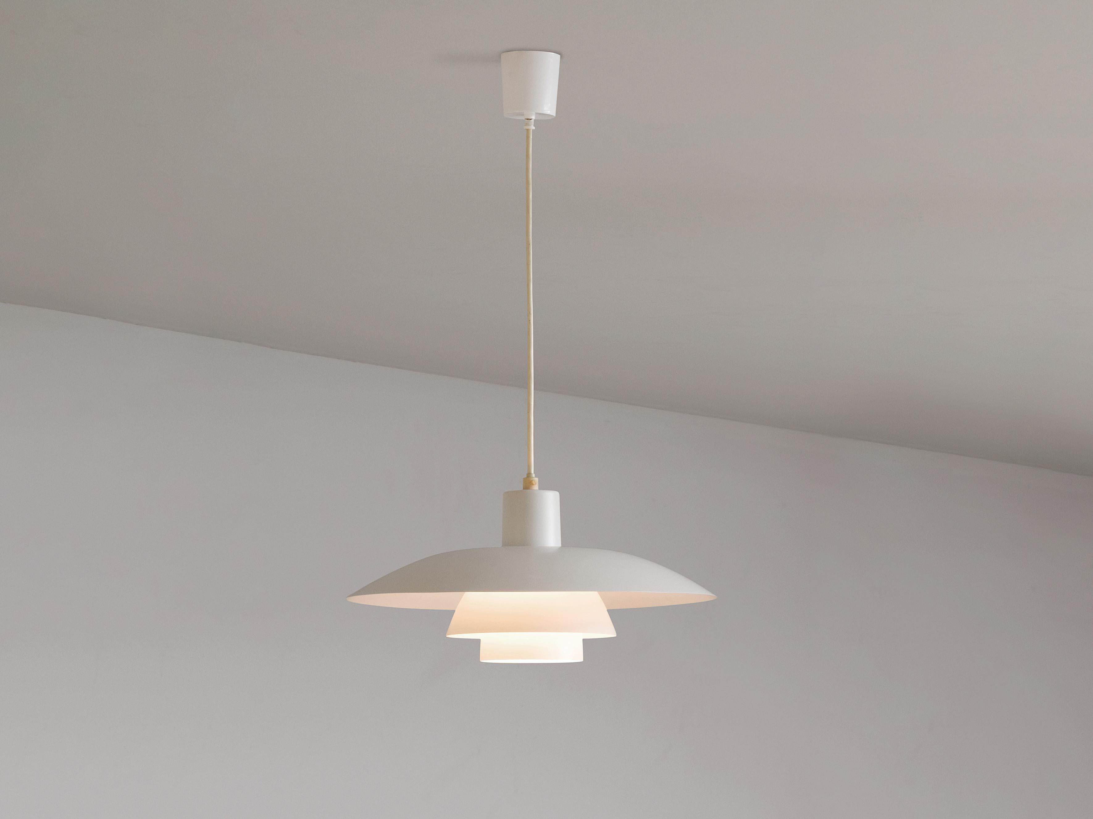 Poul Henningsen for Louis Poulsen, pendant, model PH4/3, metal, Denmark, 1950s

Iconic PH chandelier designed by Poul Henningsen. Consisting of three curved shades in white coated metal. The spectator has no direct view on the light-source itself.
