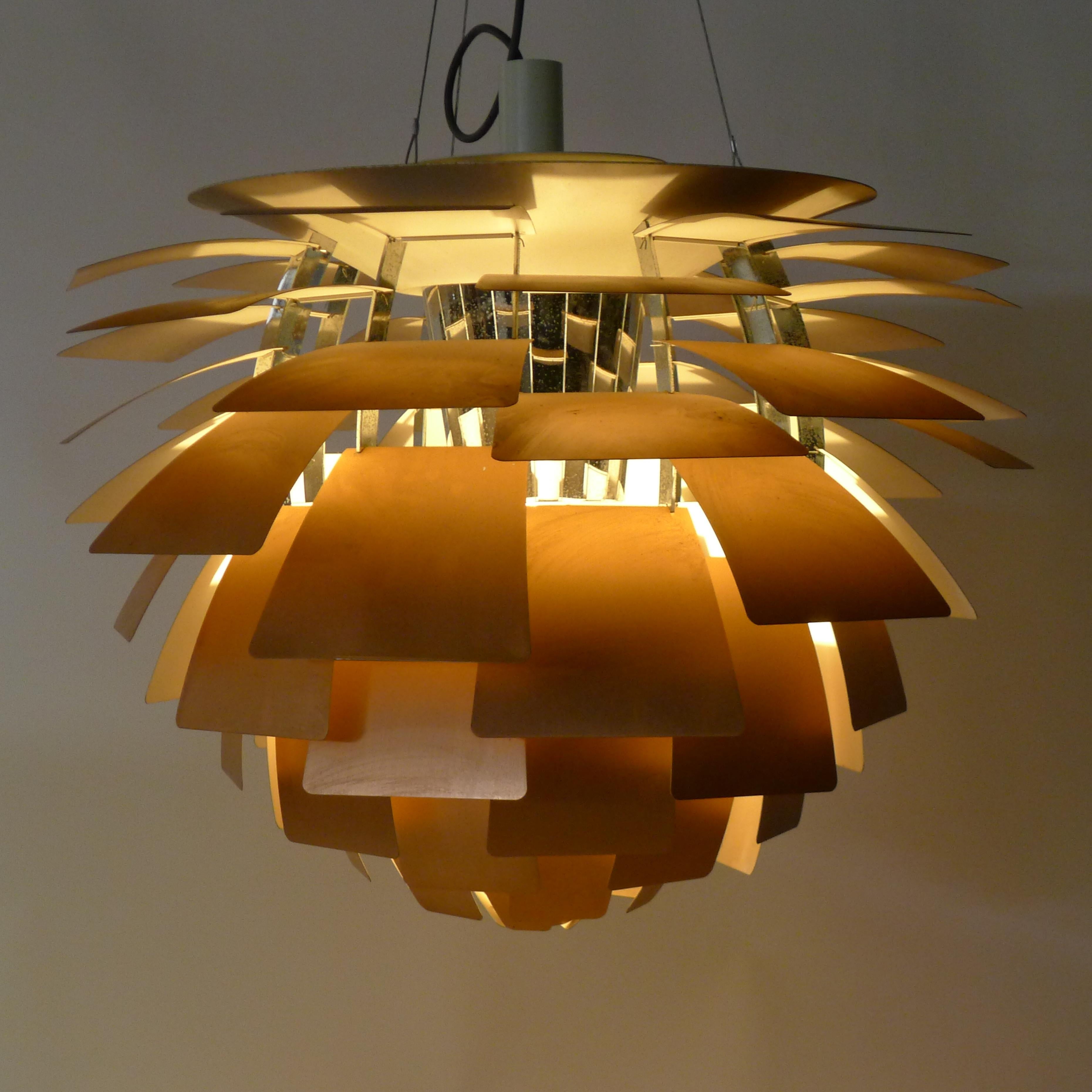 Poul Henningsen
PH Artichoke Pendant Light, produced by Louis Poulsen
large size in copper, 72 leaves

The large 'PH Artichoke' copper chandelier by Poul Henningsen for Louis Poulsen was originally designed in 1958 for the Langelinie Pavilion
