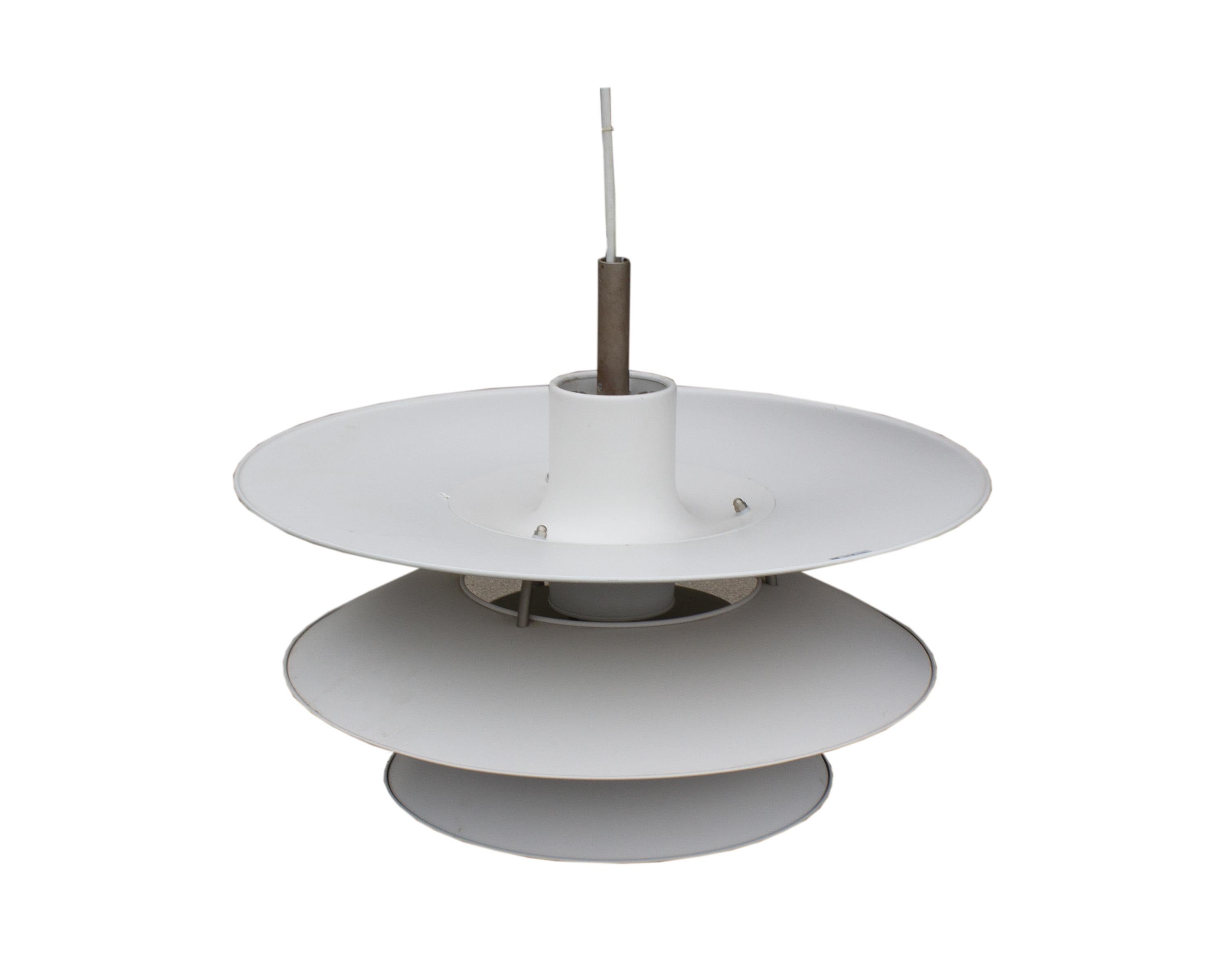 A PH6 hanging pendant lamp by Danish designer Poul Henningsen (1894-1967) for Louis Poulsen. This light, white in color, features the iconic design of Louis Poulsen pendant lights with distinct layering. Three bottom layers curve downward, while the