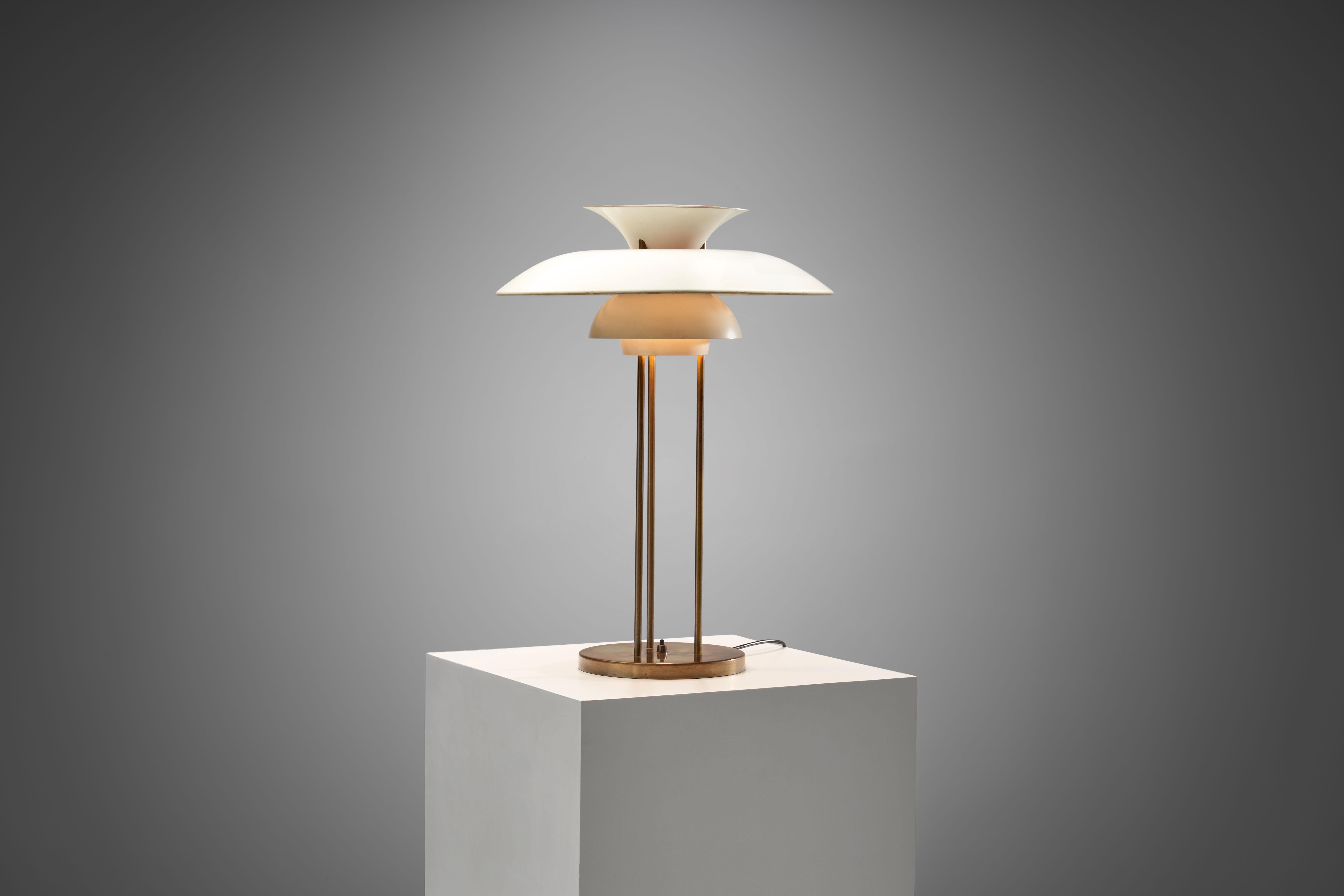 This “PH-5” table lamp from the Danish “Master of Soft Light”, Poul Henningsen is one of the designer’s most popular models, and is considered to be an icon of Scandinavian modern design.

Perhaps the most recognizable of all the Poul Henningsen