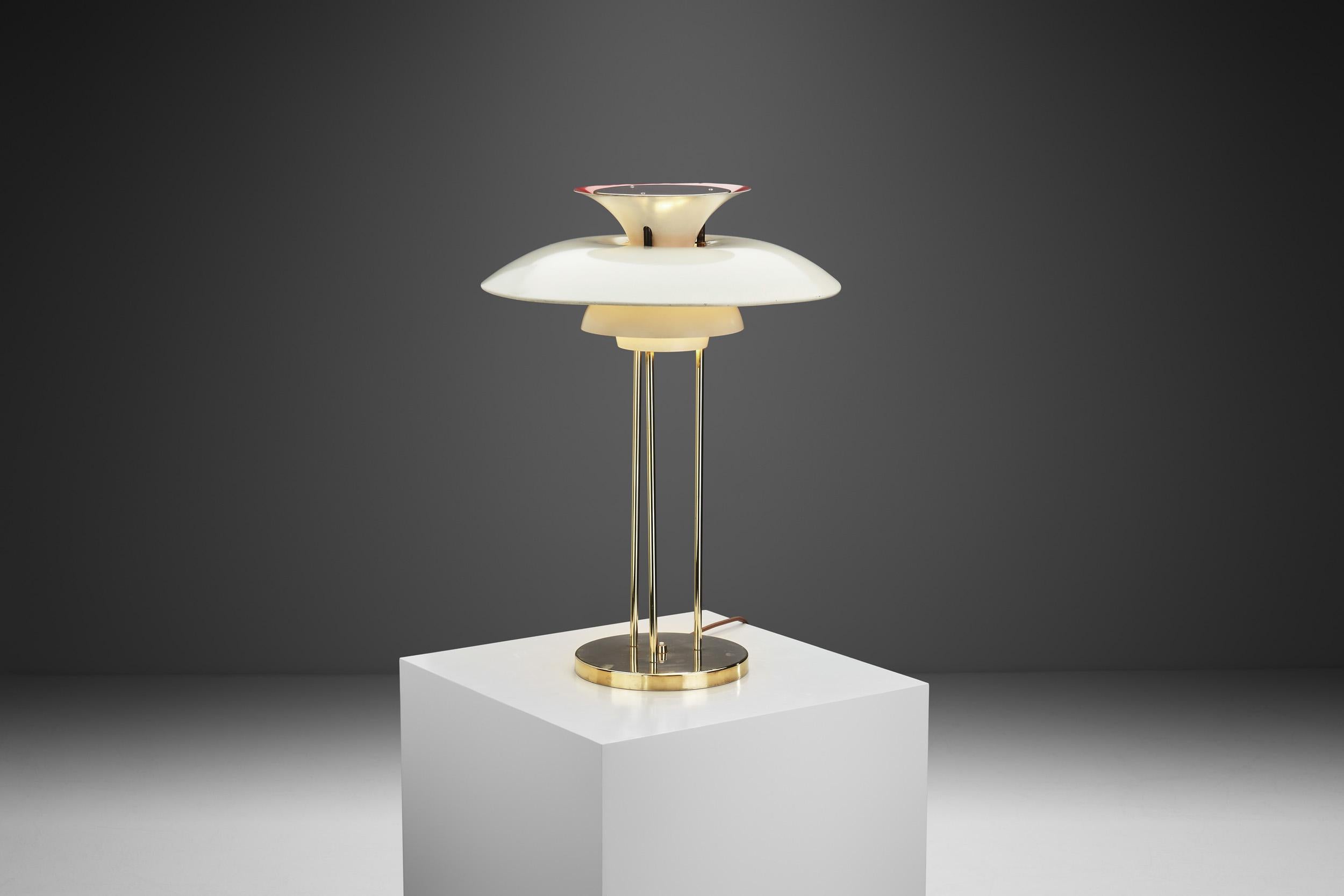 This “PH-5” table lamp from the Danish “Master of Soft Light”, Poul Henningsen, is one of the designer’s most popular models, and is considered to be an icon of Scandinavian modern lighting design.

Perhaps the most recognizable of all the Poul