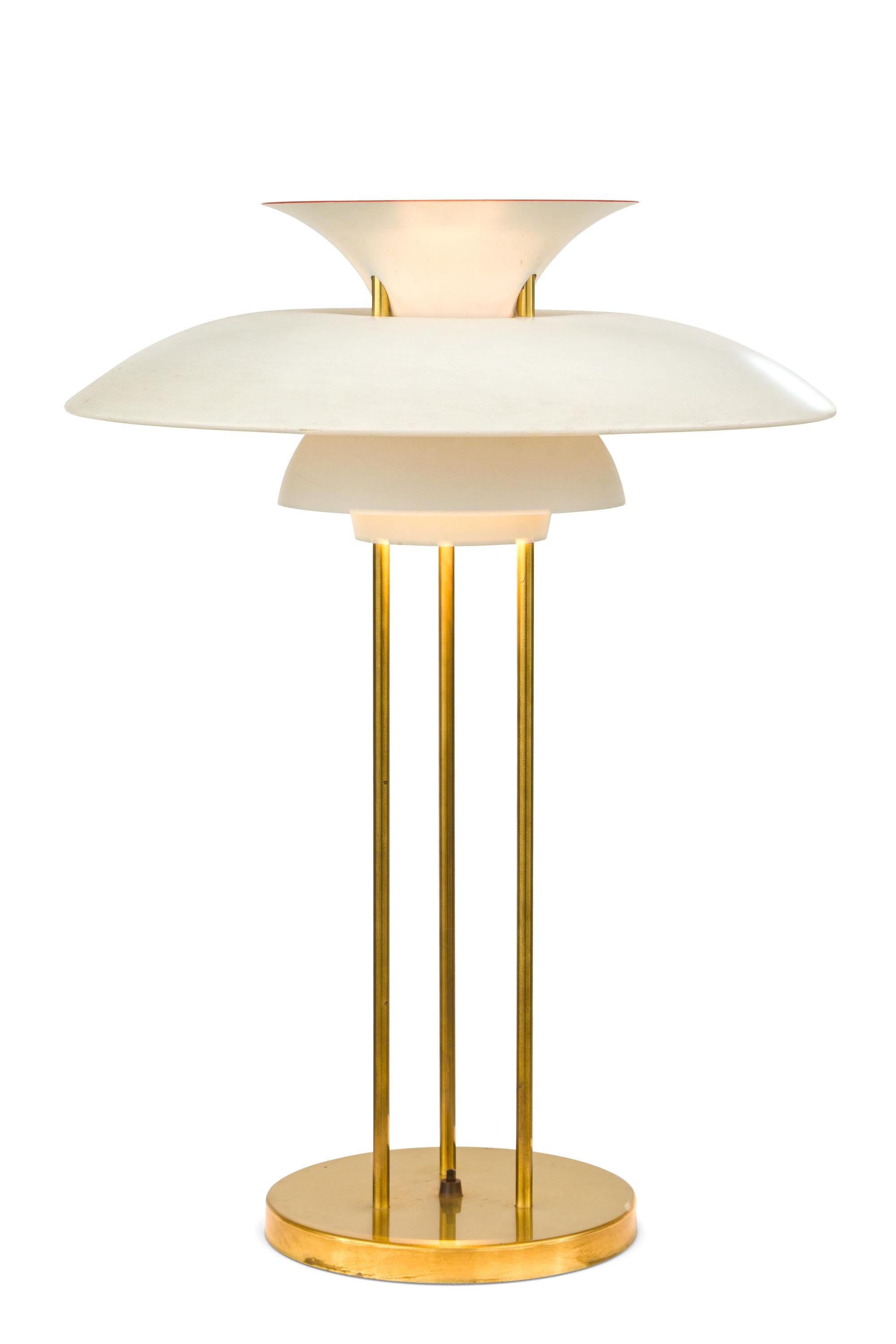 Unlike the Classic PH 3/4 table lamps this pair of lamps are supported by three vertical support rods rather than one. The shades are enameled aluminum and the support rods are brass. Sold as a pair or individually.