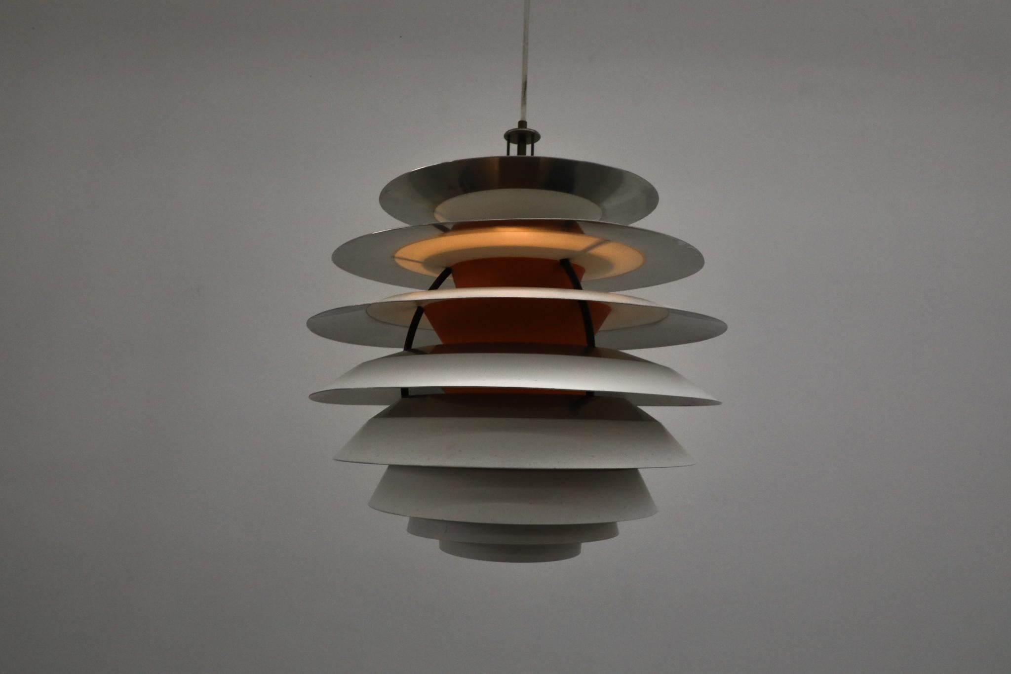 An iconic Danish Modern design, this original 'PH Kontrast' pendant light by legendary designer Poul Henningsen for Louis Poulsen. Designed between 1958-62, this groundbreaking fixture testifies to Henningsen's lifelong dedication to sculpting