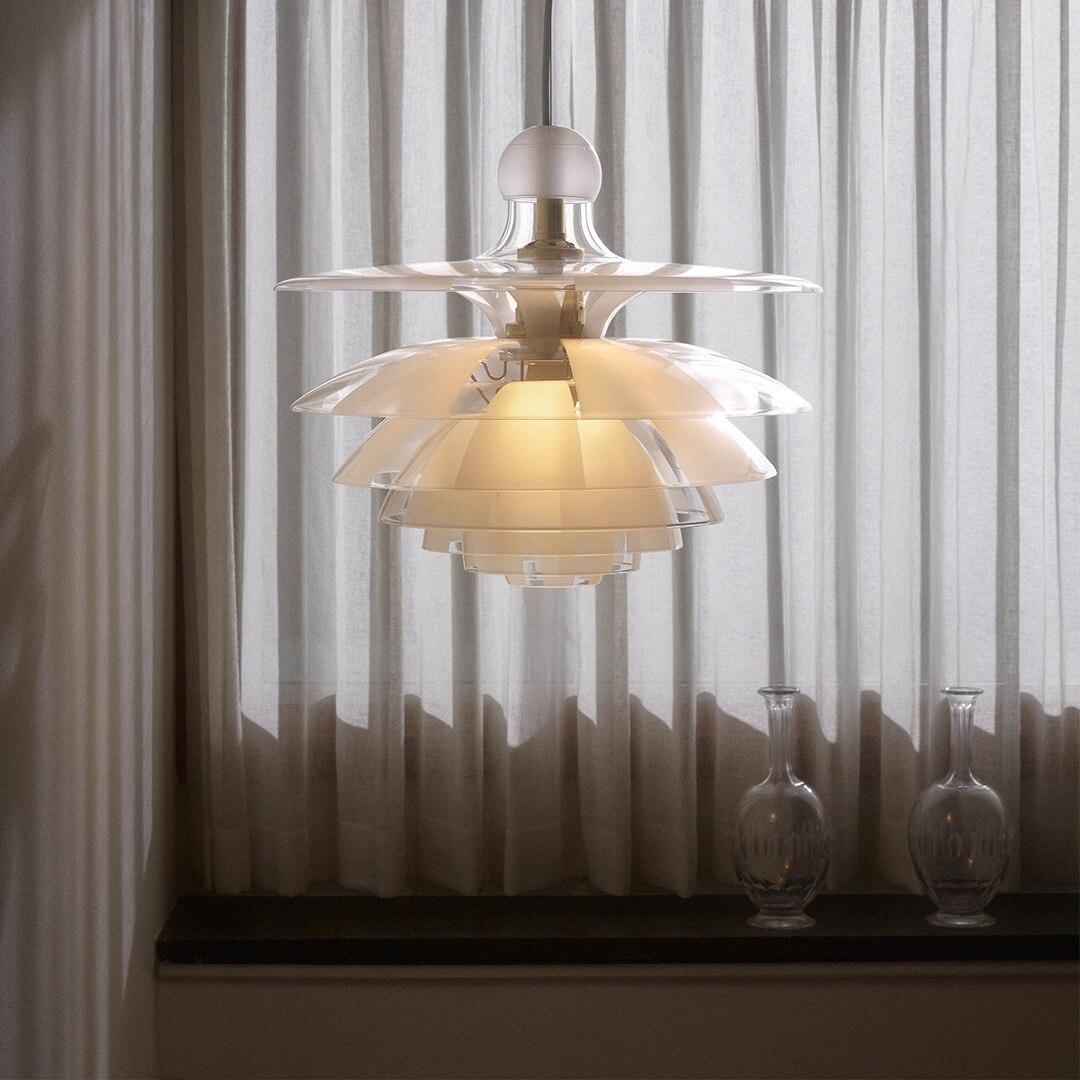 The PH Septima is regarded as one of Poul Henningsen’s most refined pendants. When exhibited for the first time as a prototype at the Danish Museum of Decorative Art (now Designmuseum Danmark) in 1928, the poetic piece was publically applauded. The